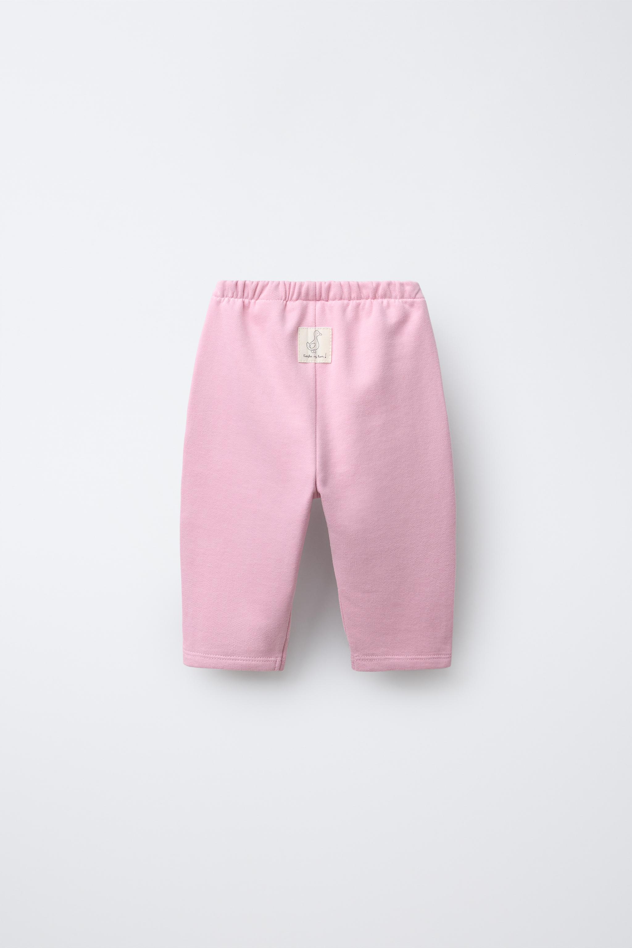 PANTALON EN MOLLETON BAGGY AVEC ÉTIQUETTE