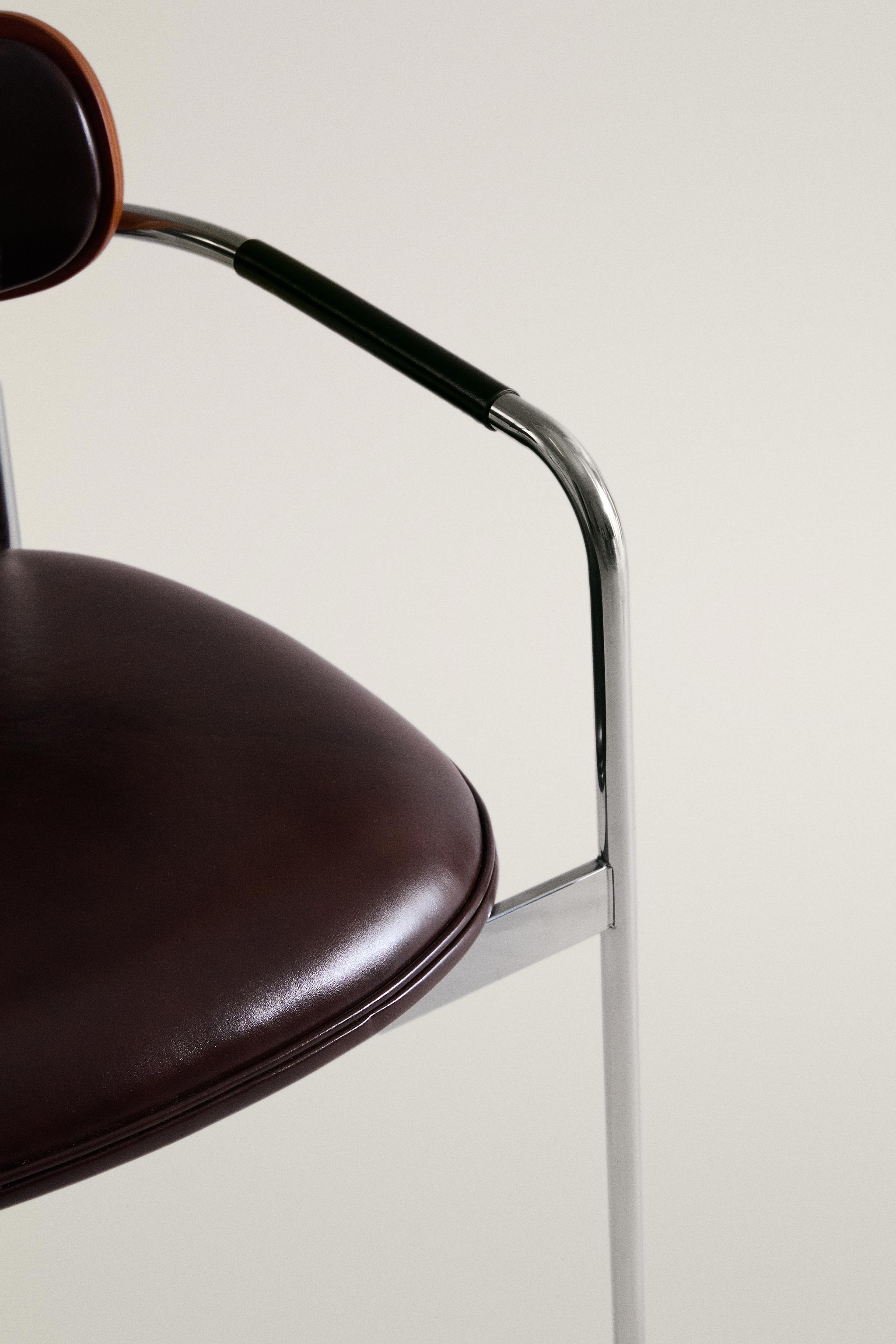 LEATHER AND STAINLESS STEEL CHAIR