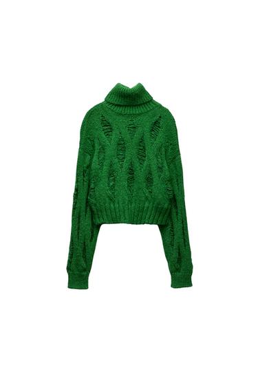 KNIT SWEATER WITH RIPS