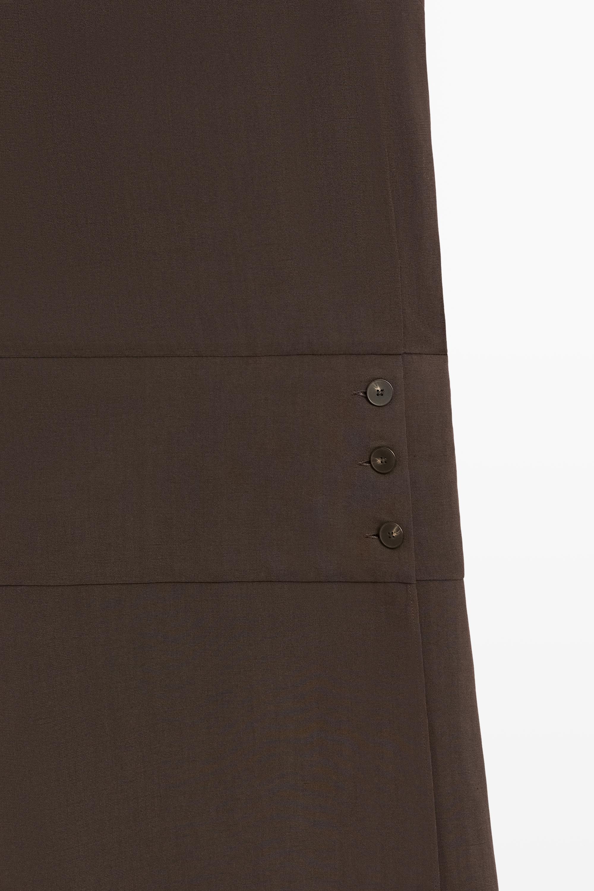 Robe midi à boutons latéraux