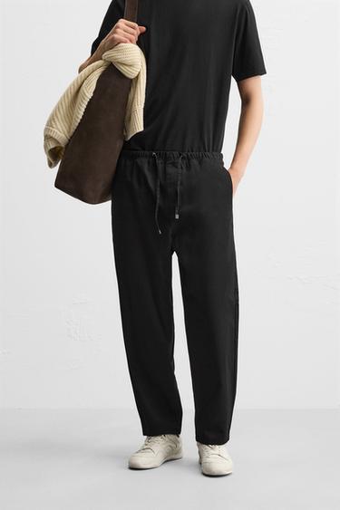 CARROT FIT TROUSERS - Black by Zara