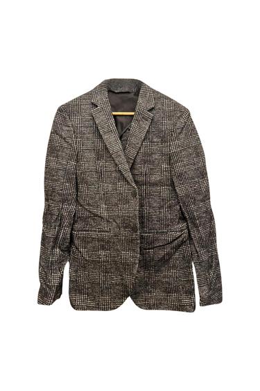 Front view of a grey checked jacket with lapel and two buttons.