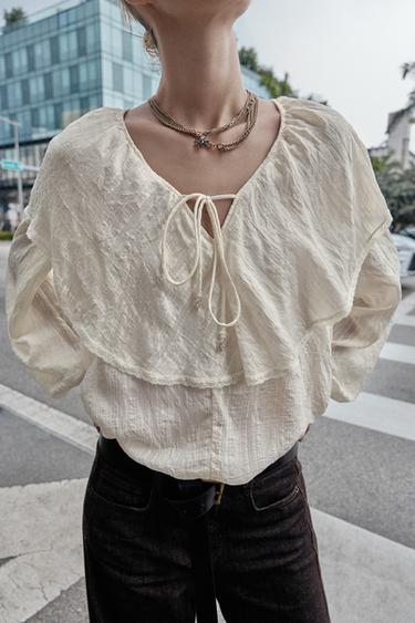 BLOUSE À VOLANTS AVEC DENTELLE - Écru de Zara - Image 1
