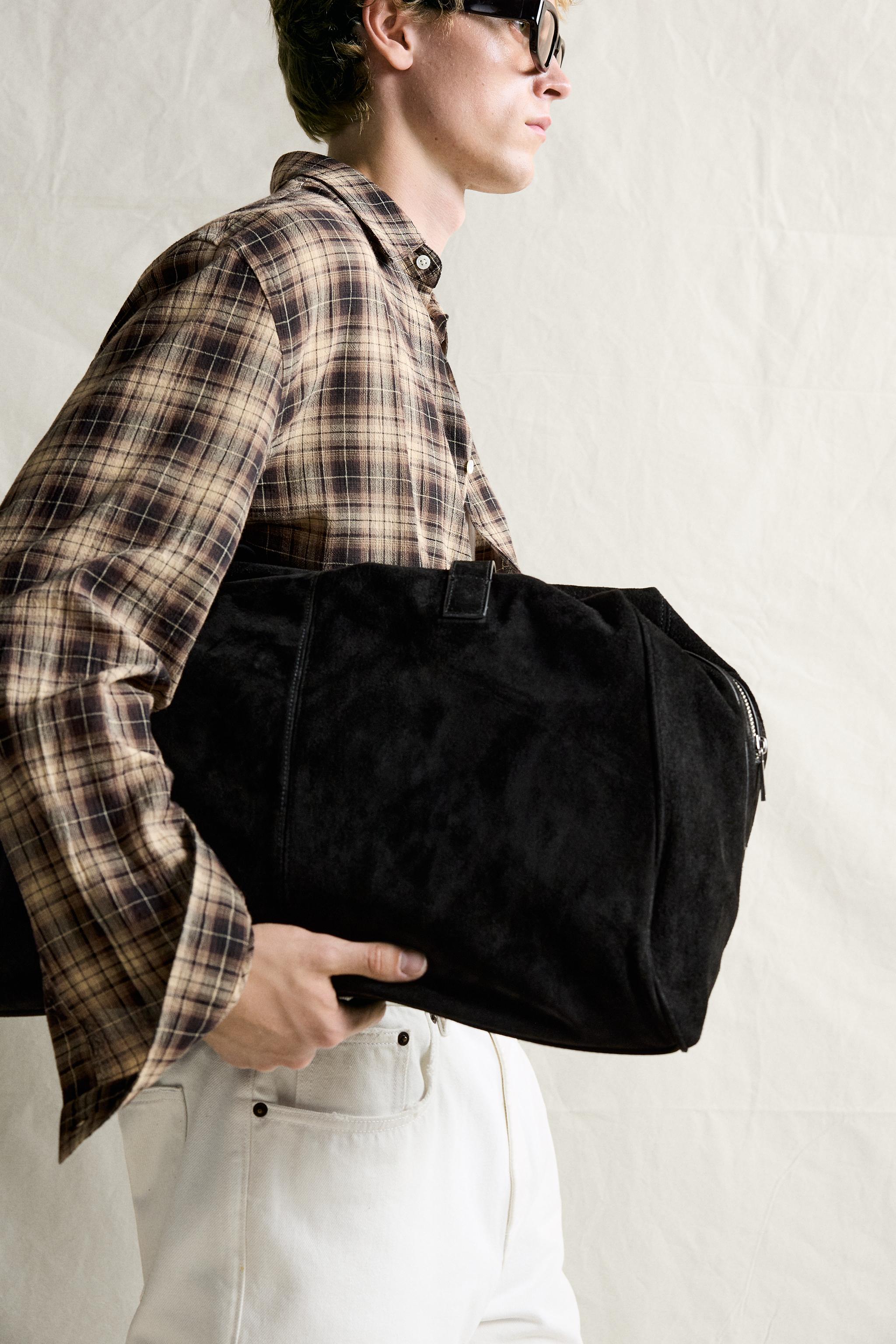 LEATHER TRAVEL BAG