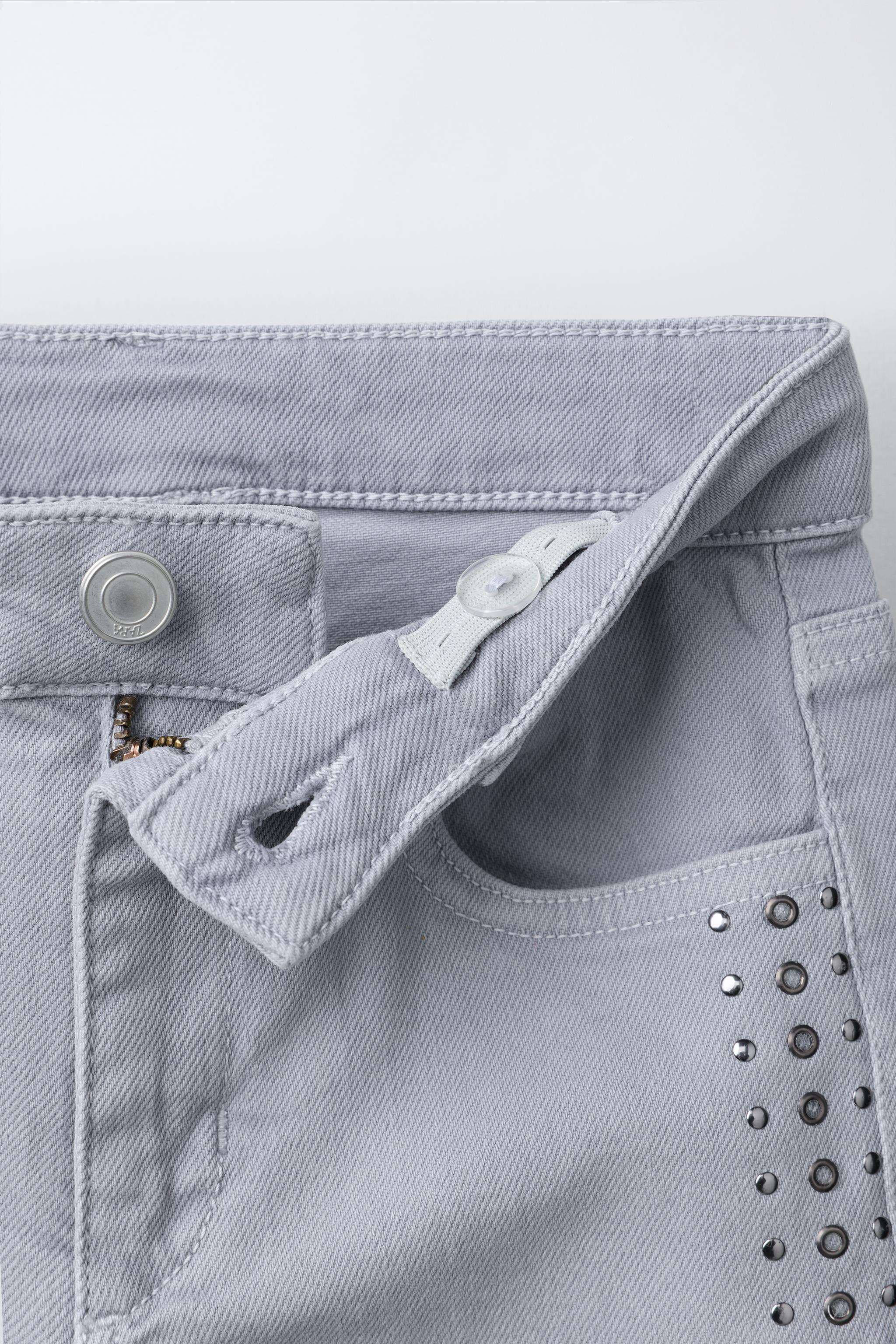 JEANS BOOTCUT À CLOUS