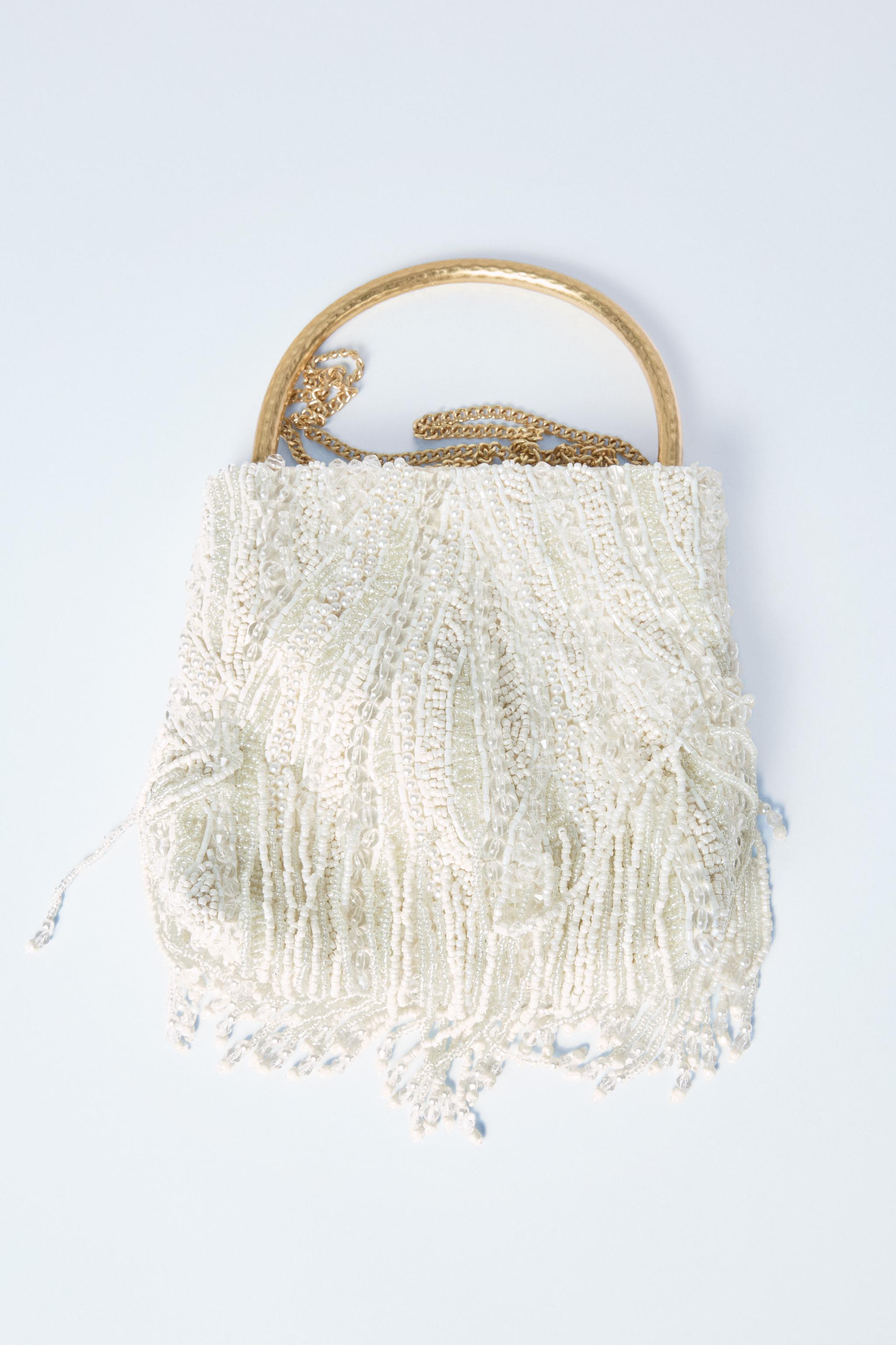 BOLSO DE MANO APLIQUES