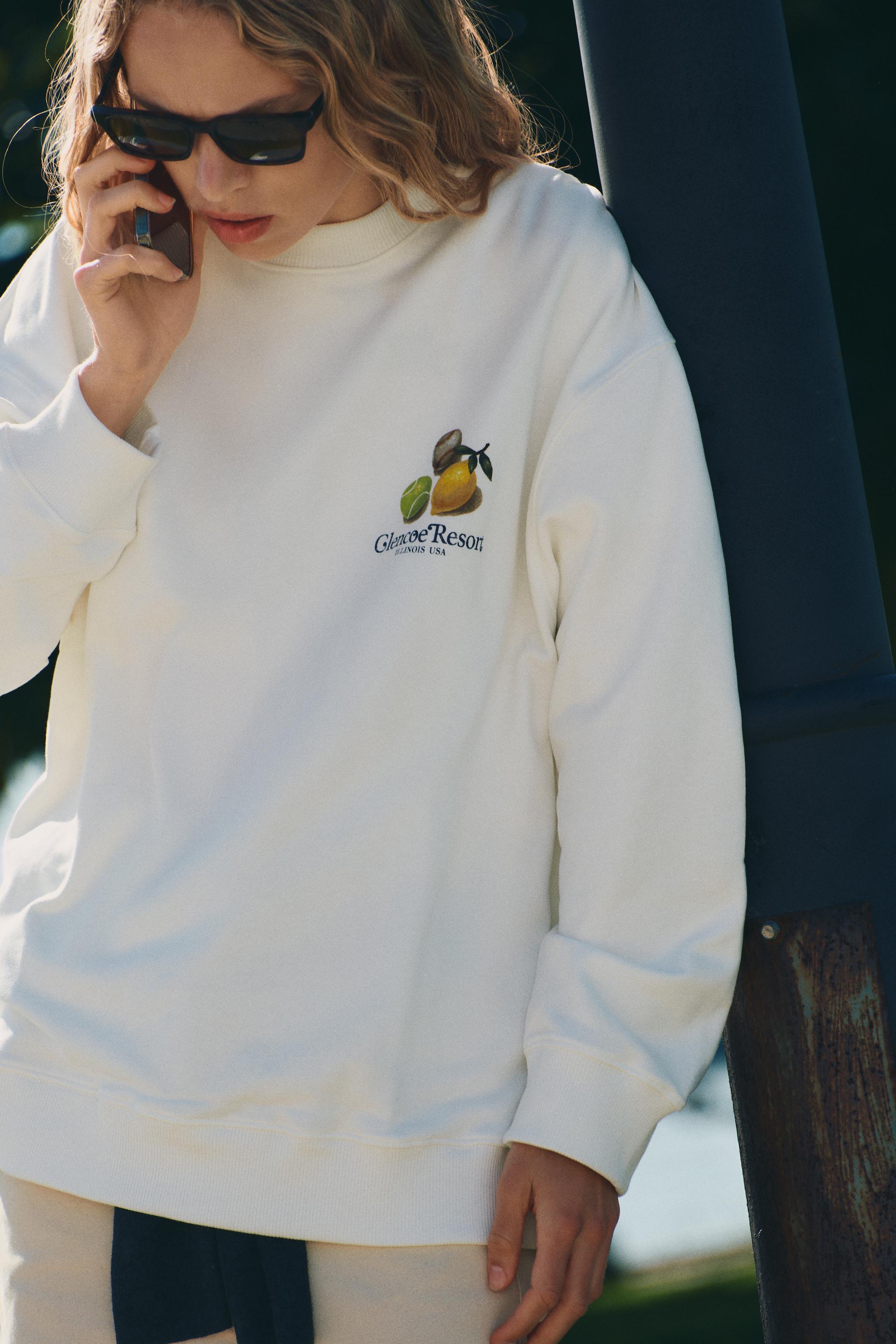 PRINTED PLUSH SWEATSHIRT