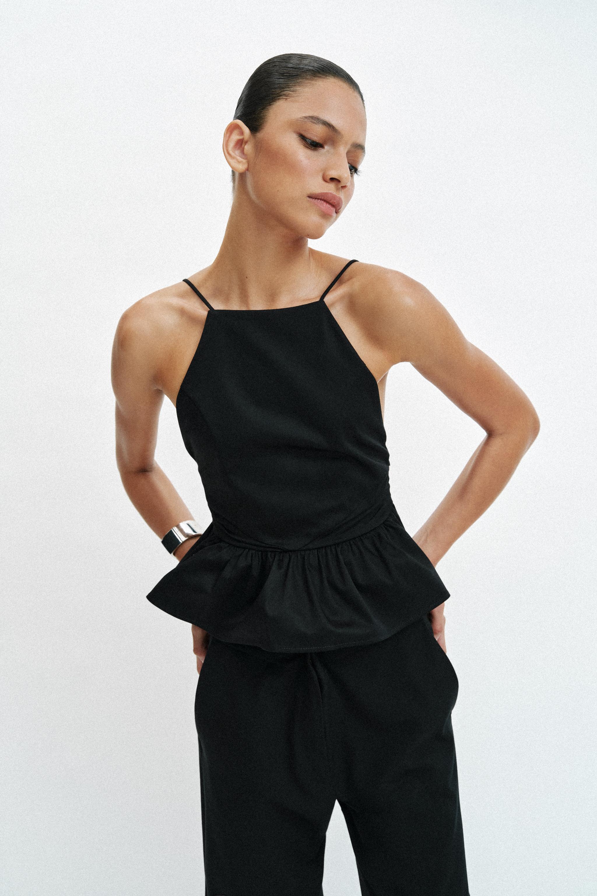 HALTER PEPLUM TOP — Black