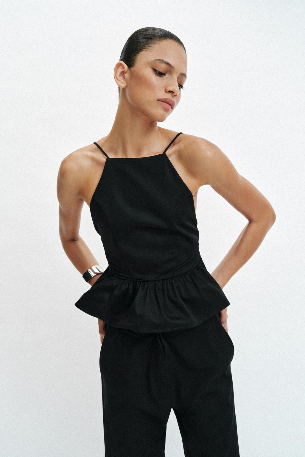 PEPLUM HALTER TOP