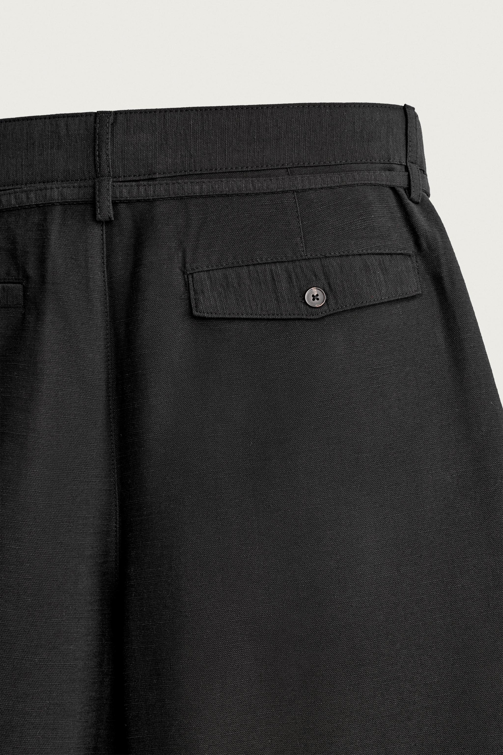 RELAXED FIT BELTED PLEATED SHORTS