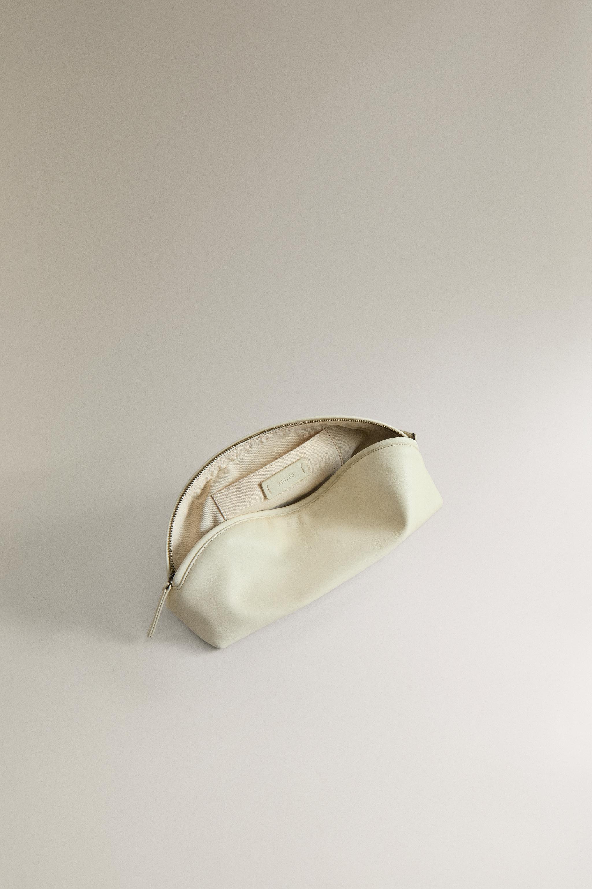 TROUSSE DE TOILETTE CUIR DEMI-LUNE