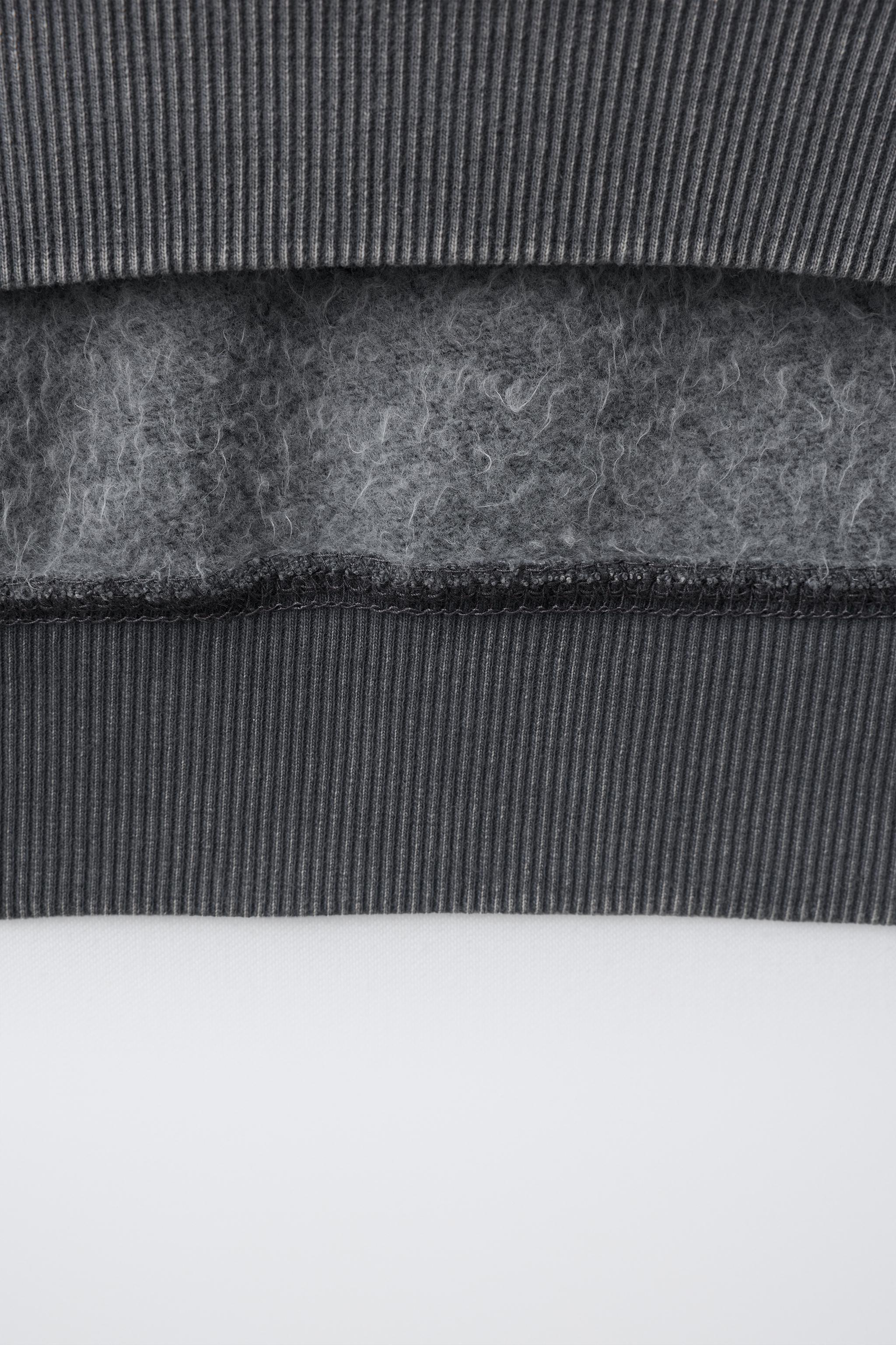 SWEAT EFFET DÉLAVÉ PEINTURE