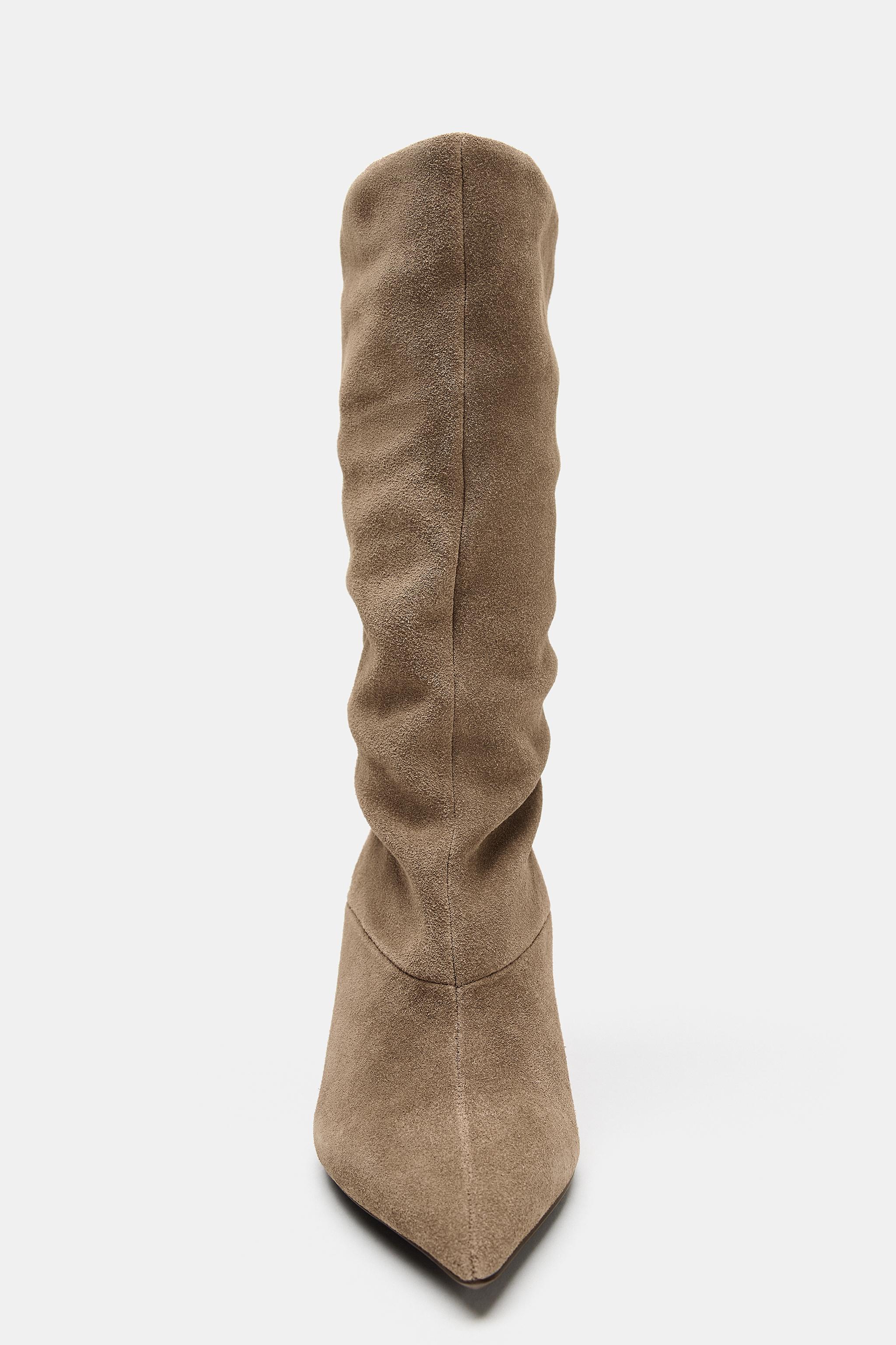 BOTTES À TALONS FRONCÉES EN CROÛTE DE CUIR