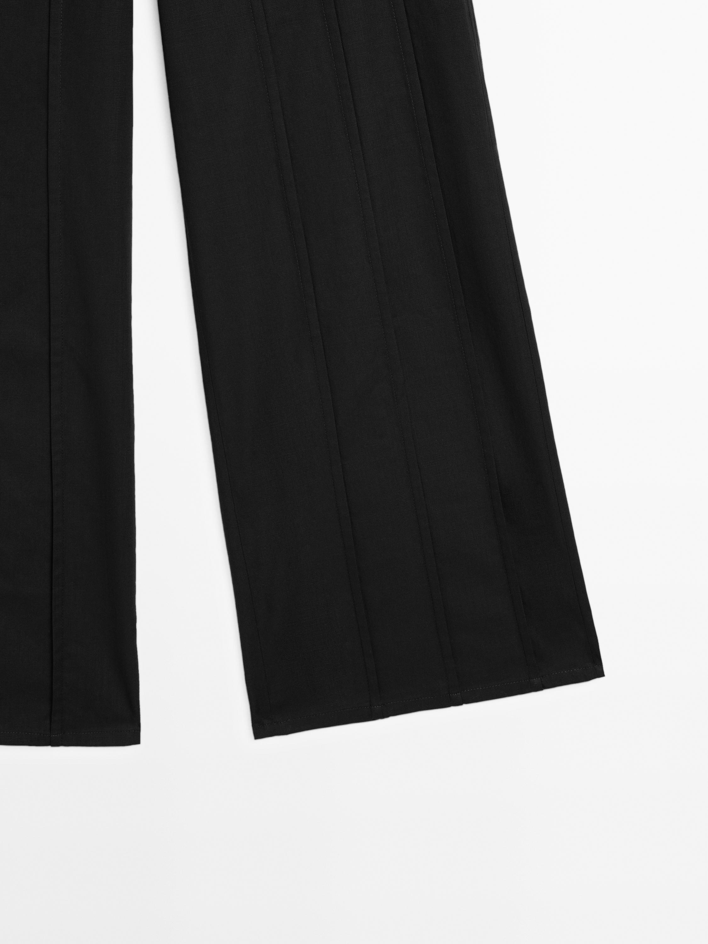Pantalon large coutures apparentes