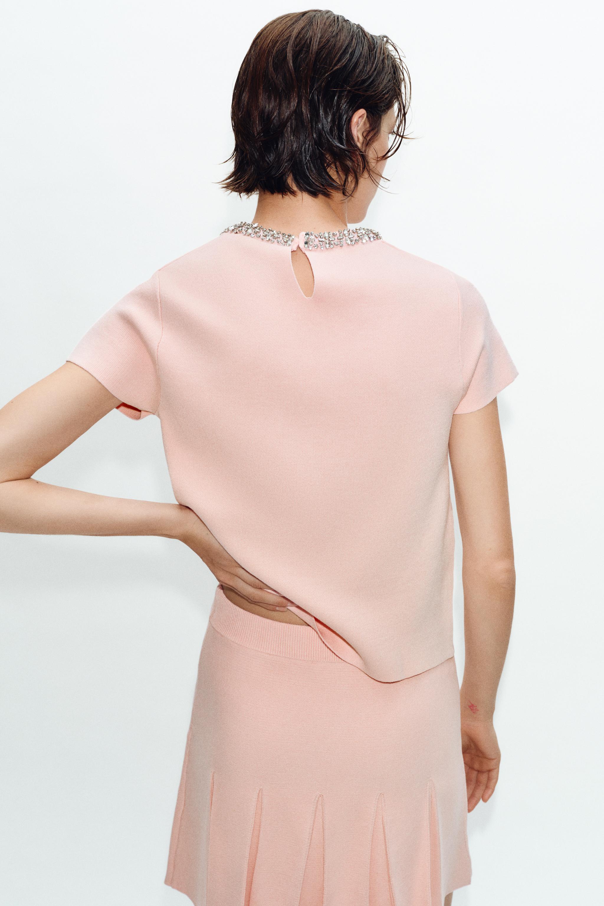 TOP EN MAILLE AVEC FANTAISIE BIJOU