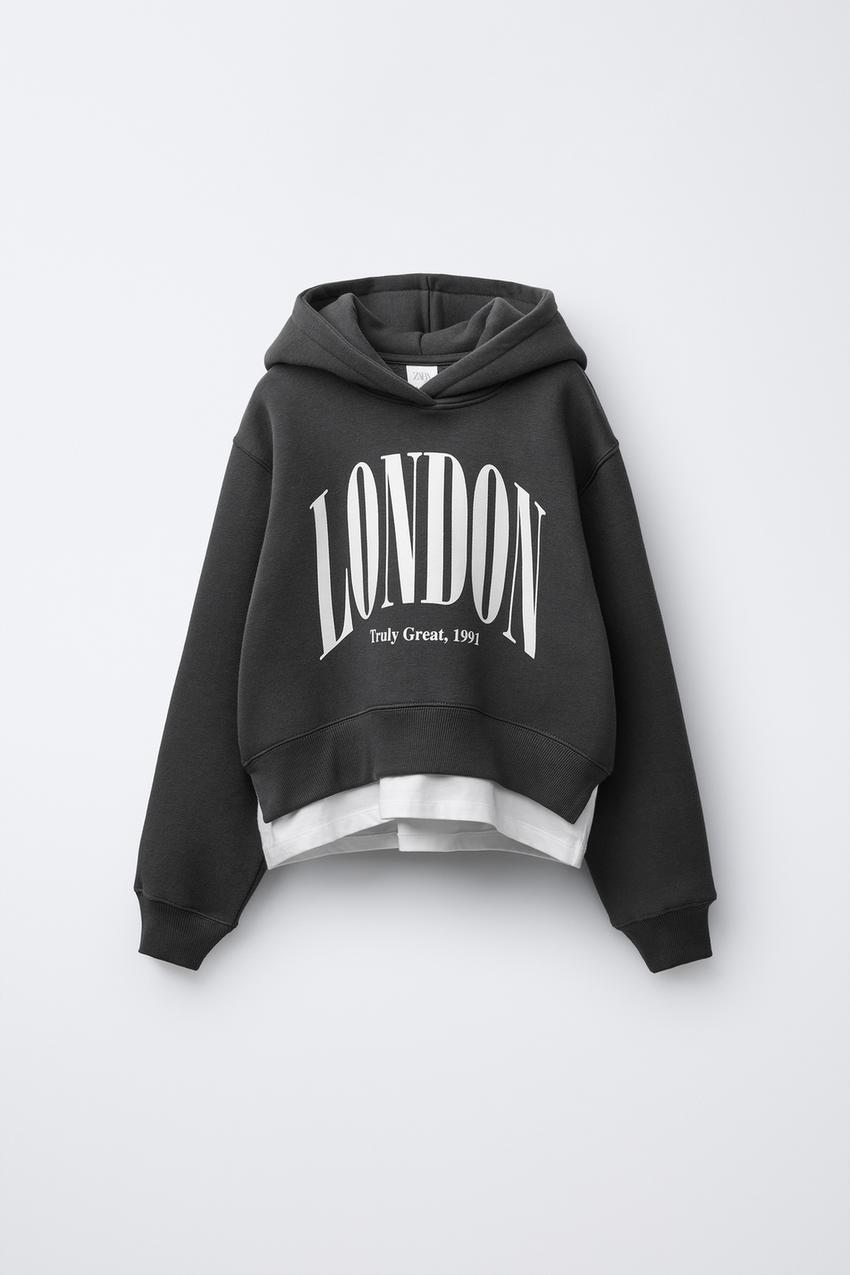 VARSITY DOUBLE HEM HOODED SWEATSHIRT