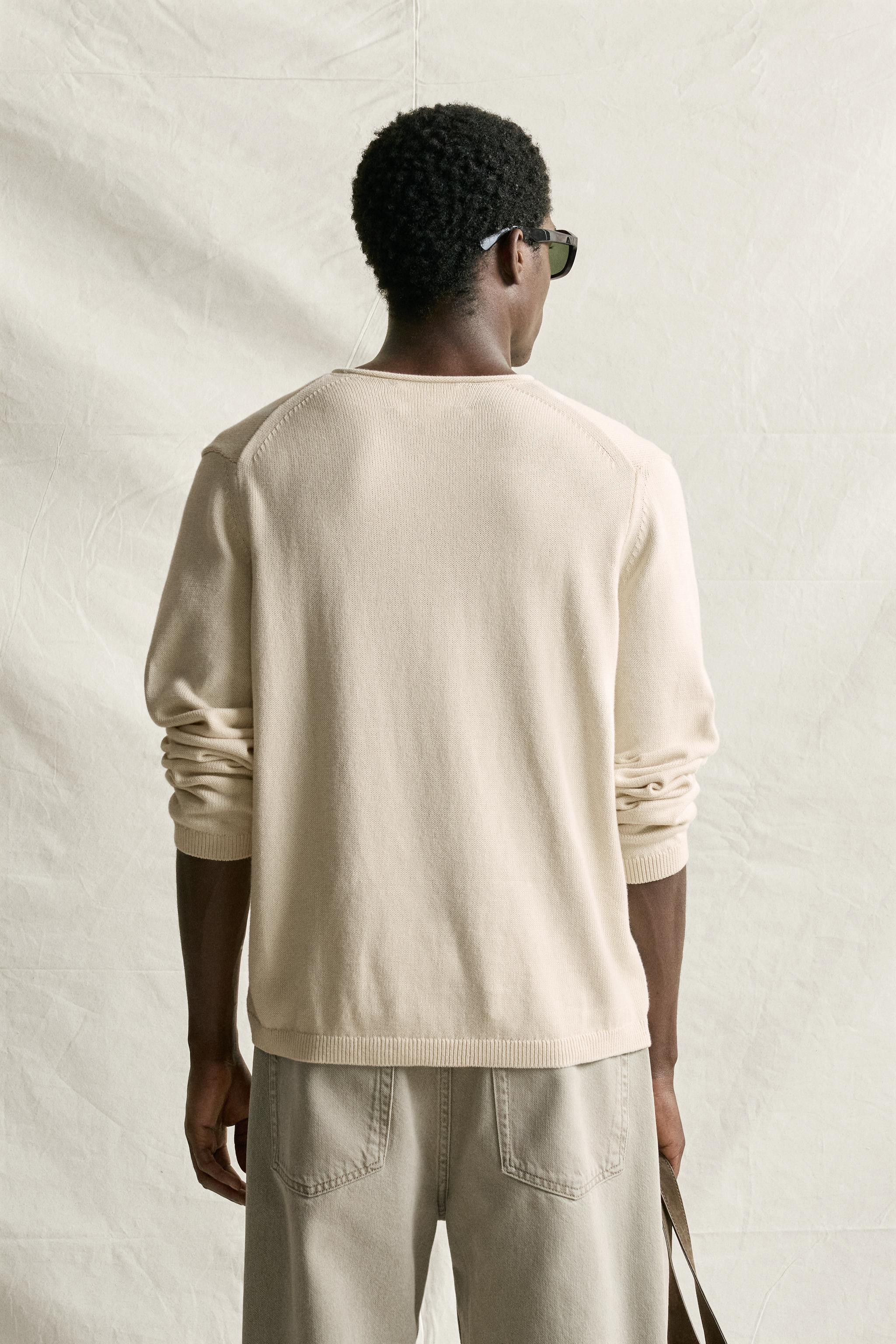 RELAXED FIT COTTON V-NECK SWEATER