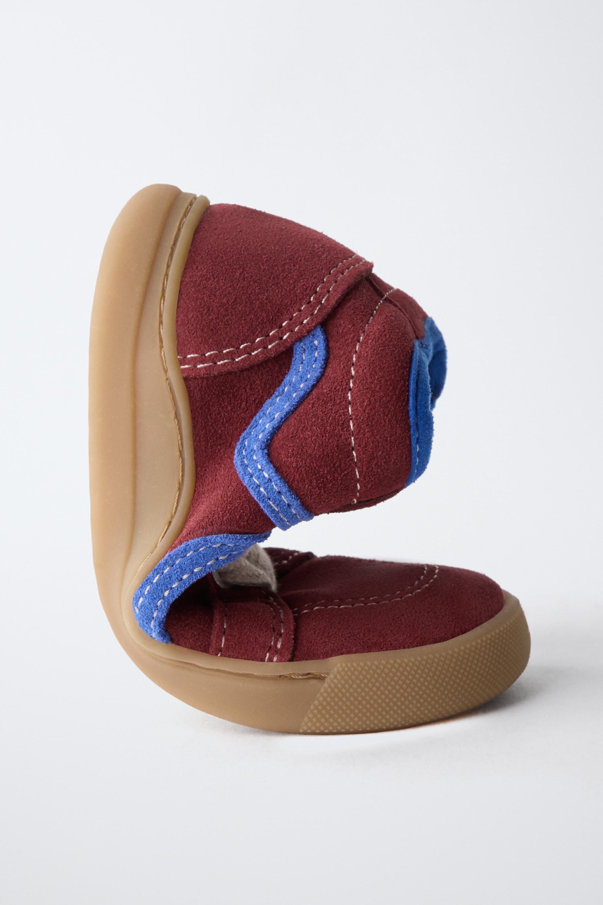 BASKETS MONTANTES EN CUIR