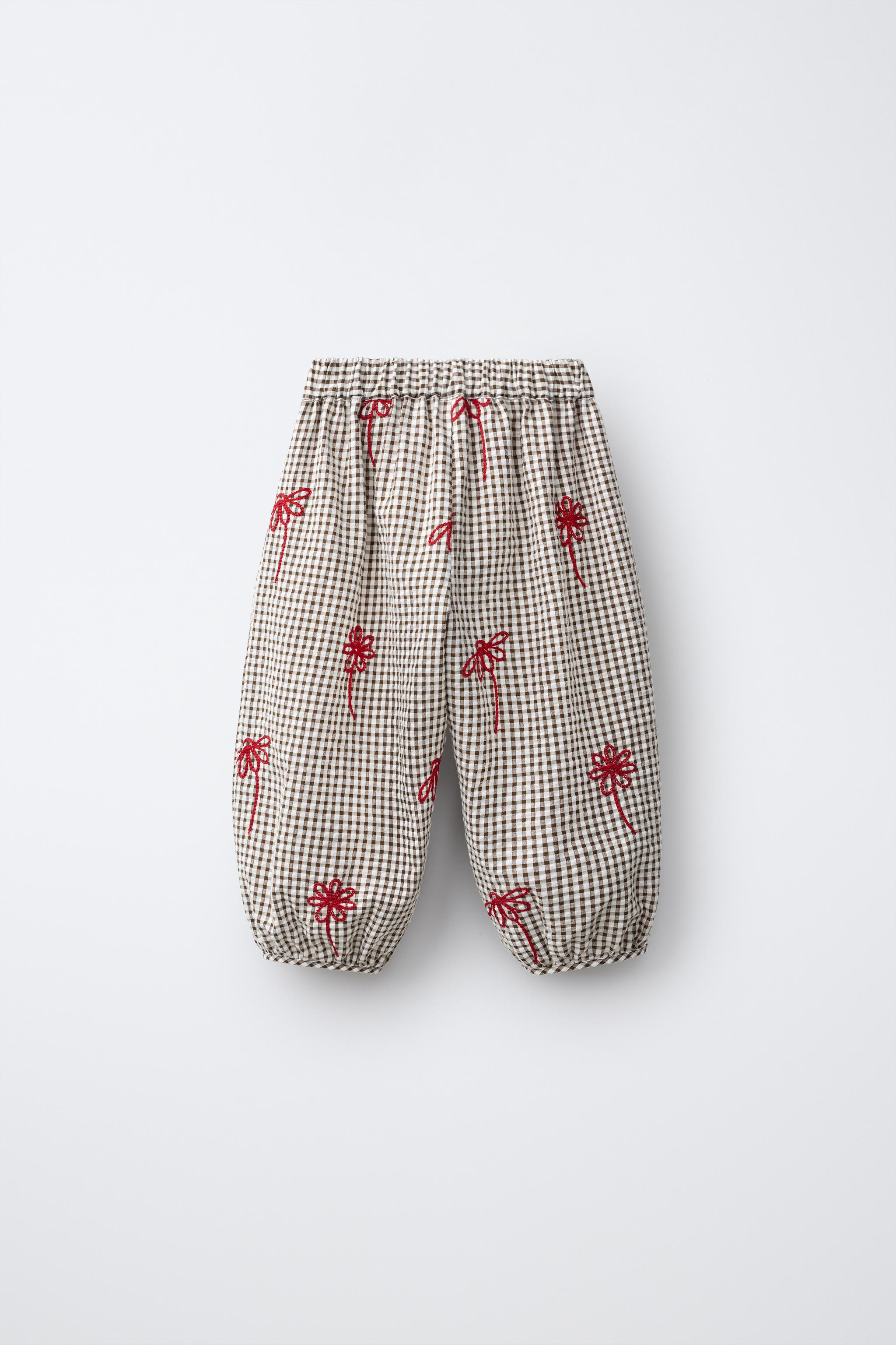 PANTALON SAROUEL À CARREAUX ET FLEURS BRODÉES