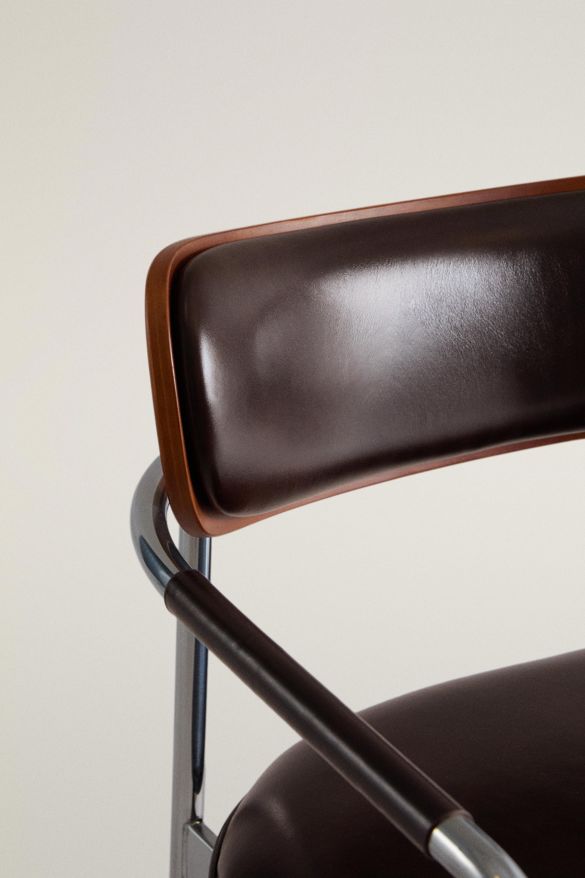 LEATHER AND STAINLESS STEEL CHAIR