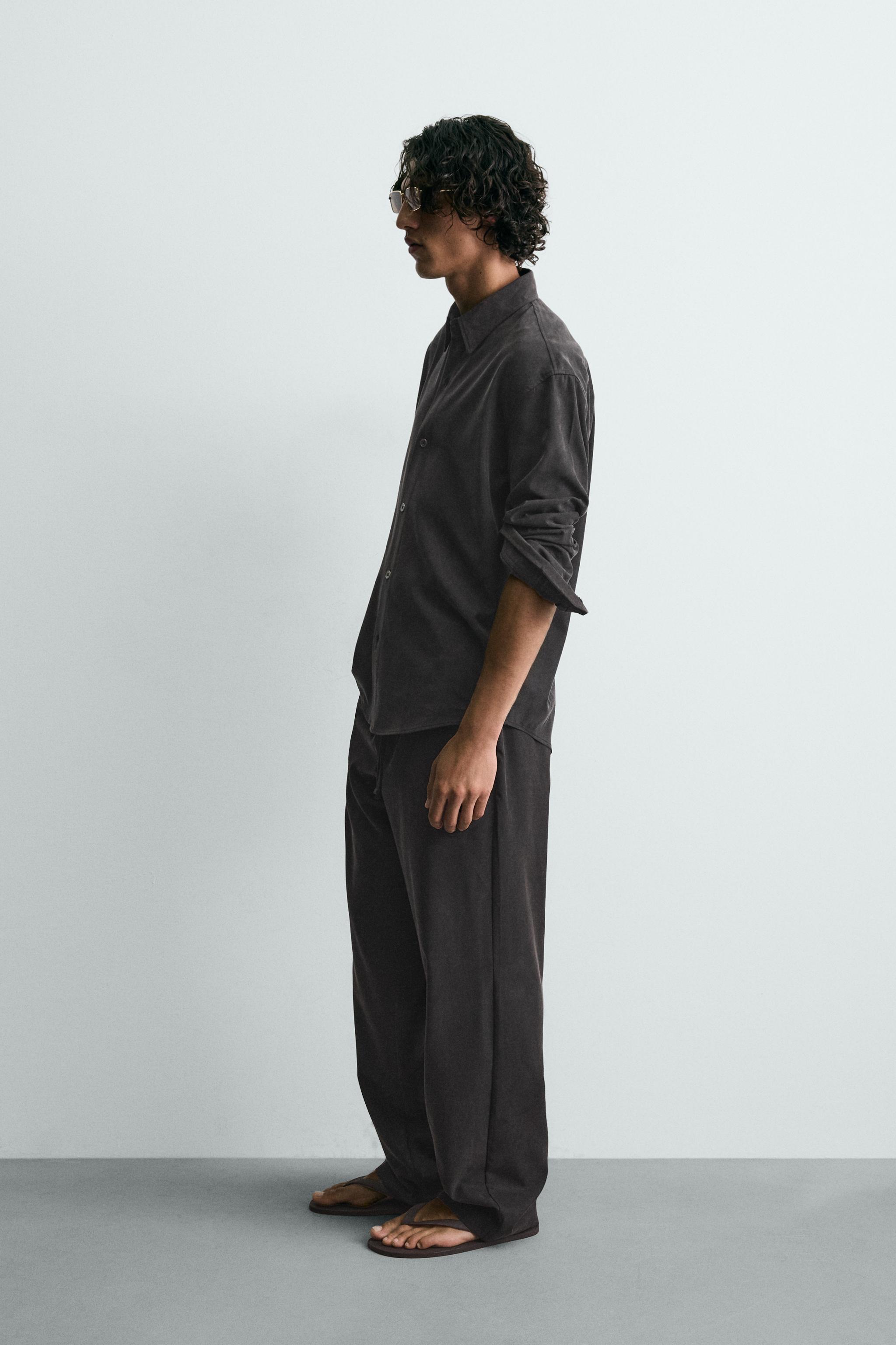 RELAXED FIT FLOWY PANTS