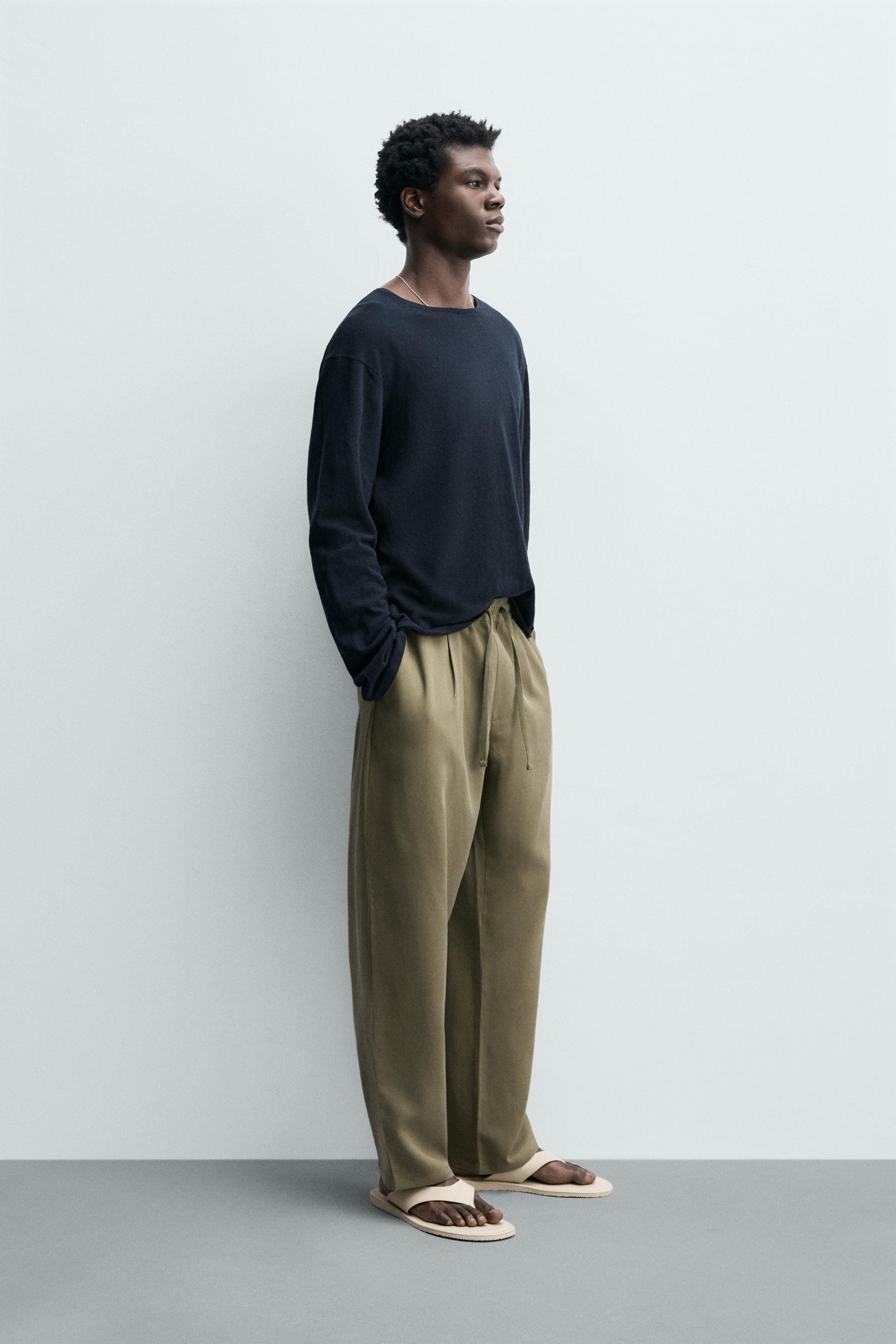 RELAXED FIT FLOWY PANTS