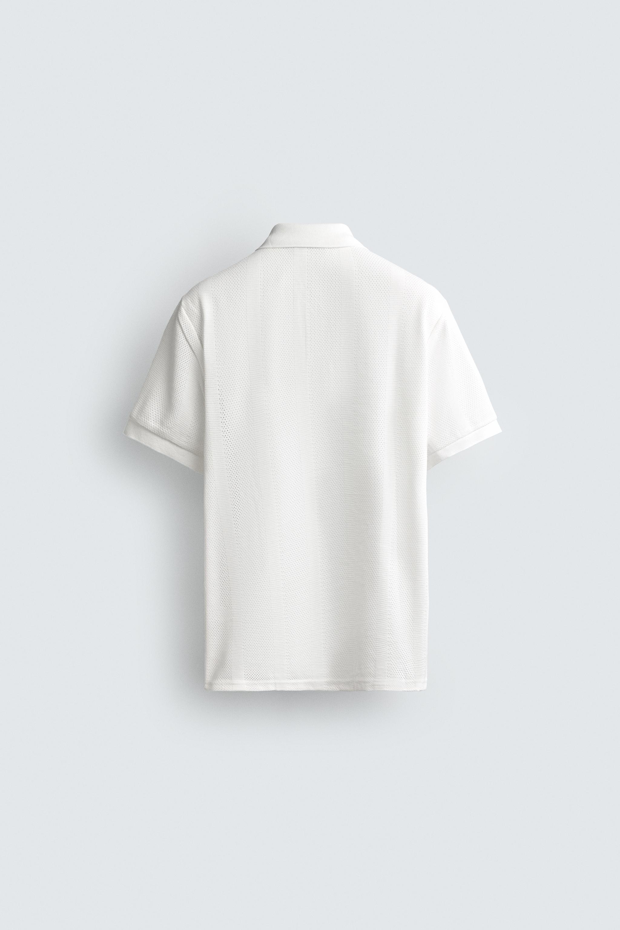 POLO REGULAR FIT EN JACQUARD À RAYURES