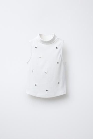 CAMISETA RIB CUELLO VUELTO TACHAS ESTRELLAS  - Blanco de Zara - Imagen 0