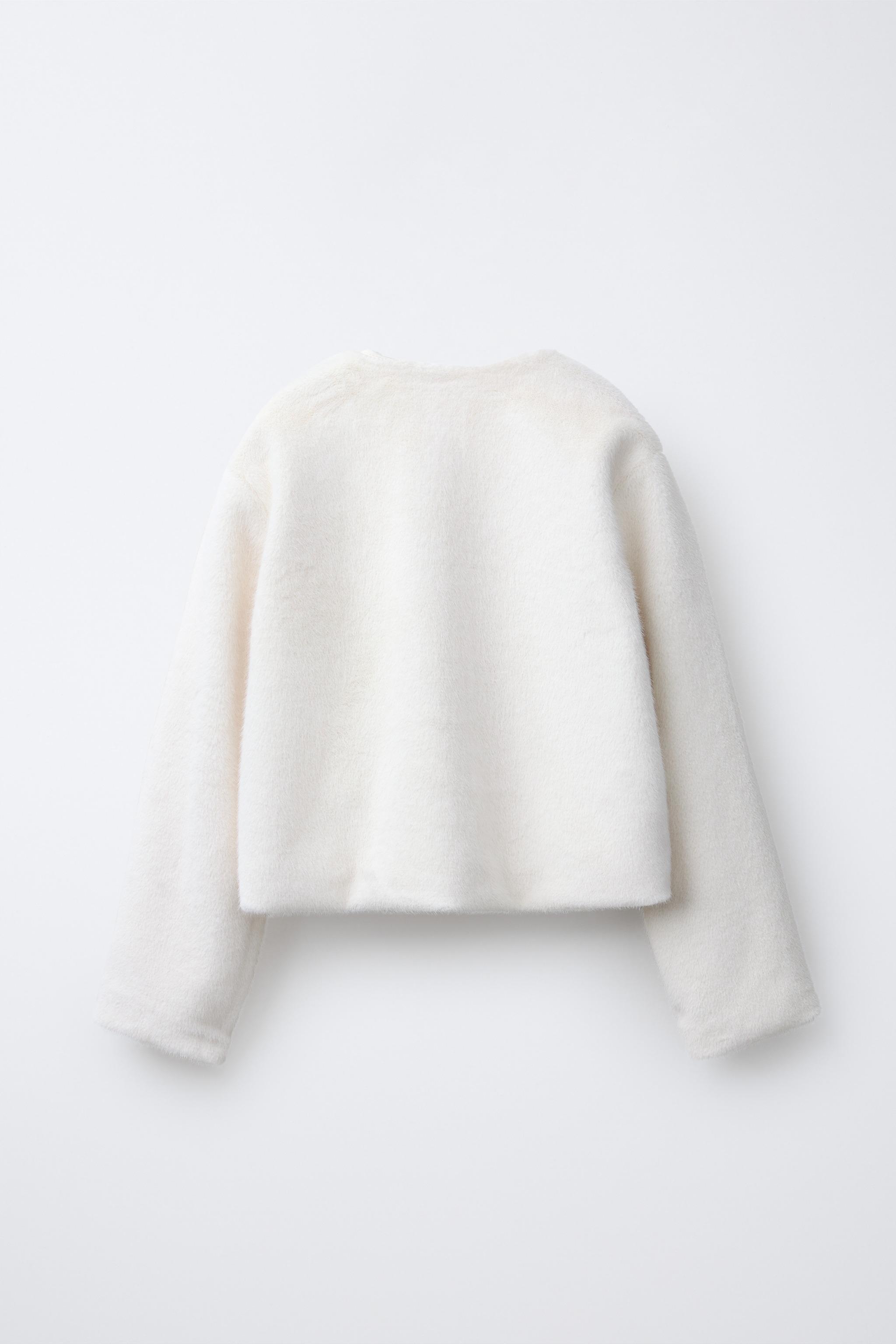 VESTE BOLÉRO EN FAUSSE FOURRURE