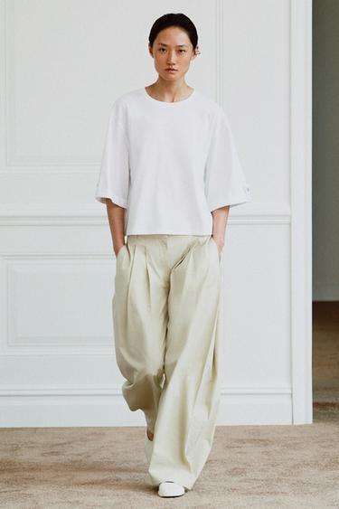 CAMISETA ASIMÉTRICA BOTÓN - Blanco de Zara