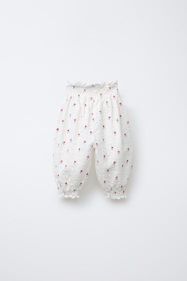 PANTALON À TEXTURE IMPRIMÉ FLEURS - Blanc cassé de Zara - Image 1
