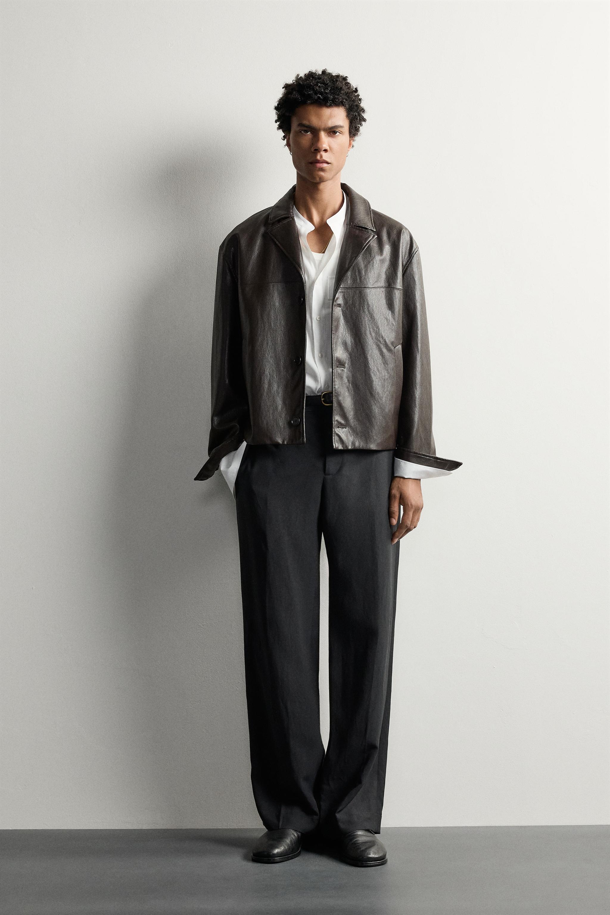 BLOUSON COURT EN MATIÈRE SYNTHÉTIQUE