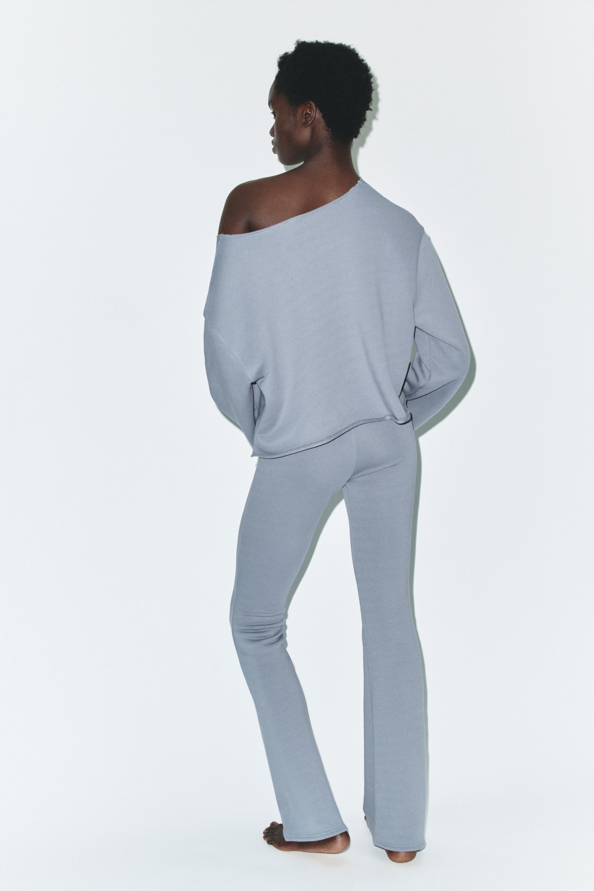 WASHED-EFFECT FLARE TROUSERS