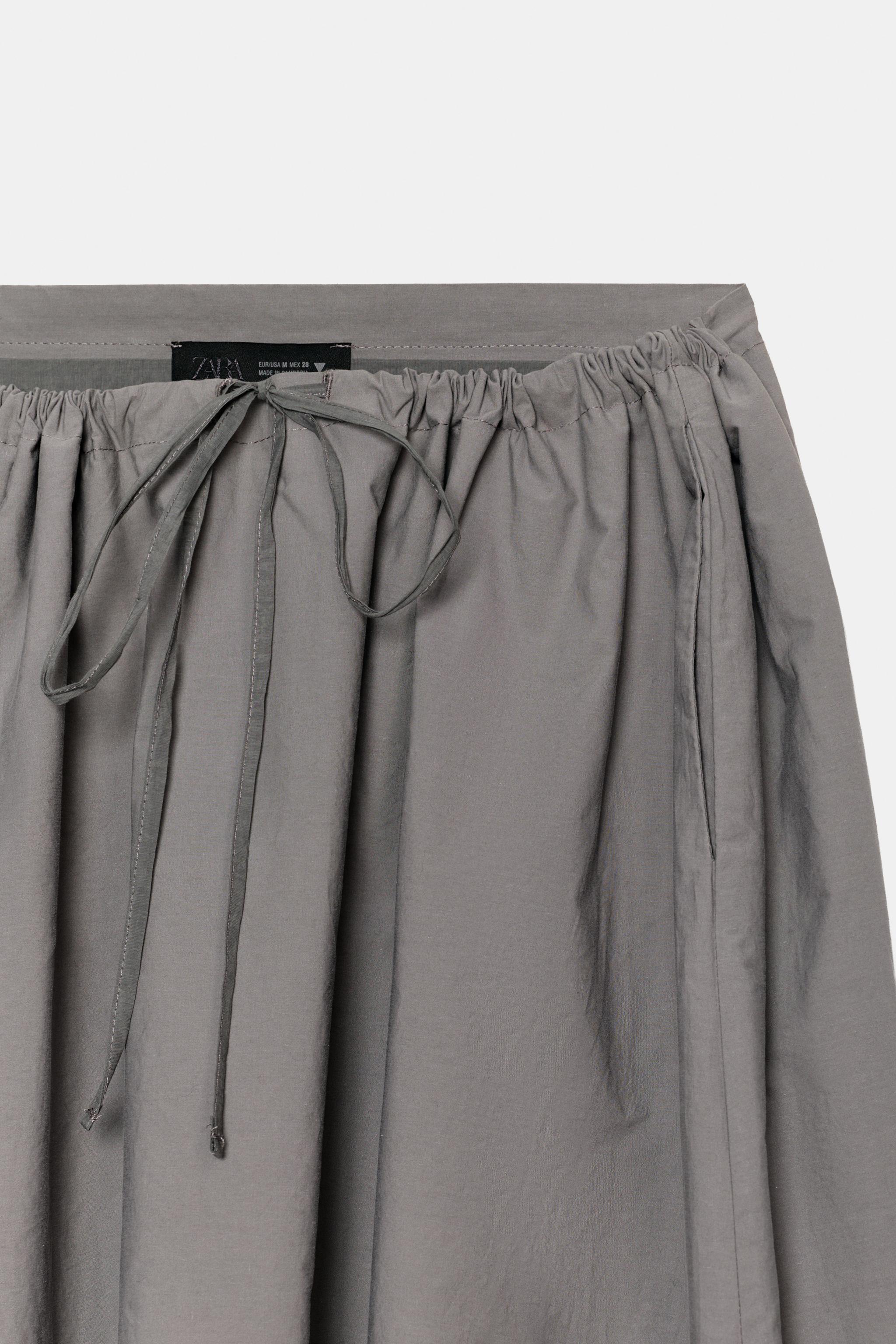COMBINATION CAPE MIDI SKIRT