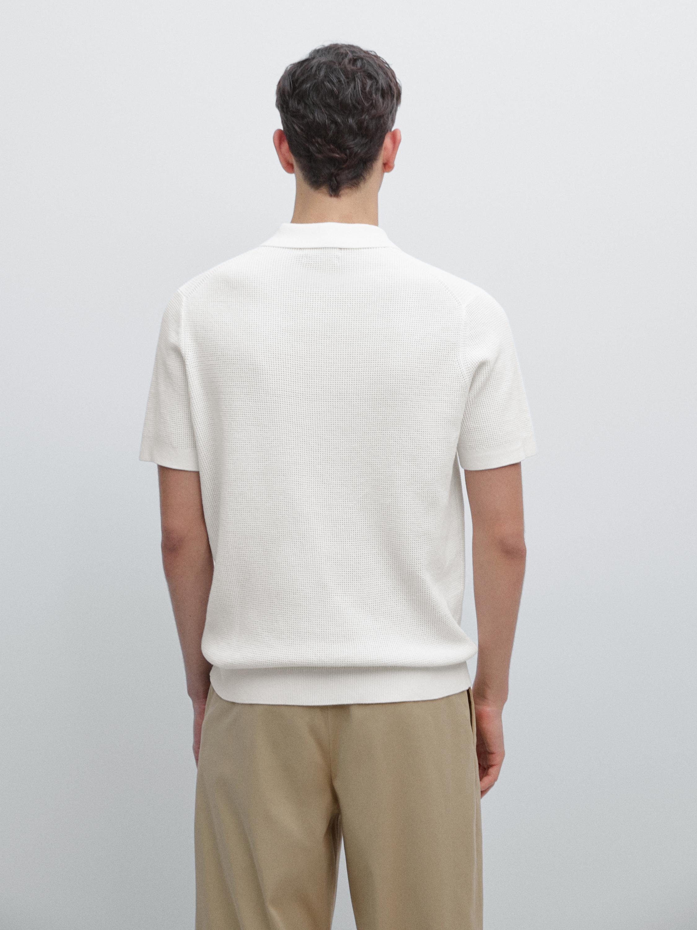 Polo en maille texturée de coton