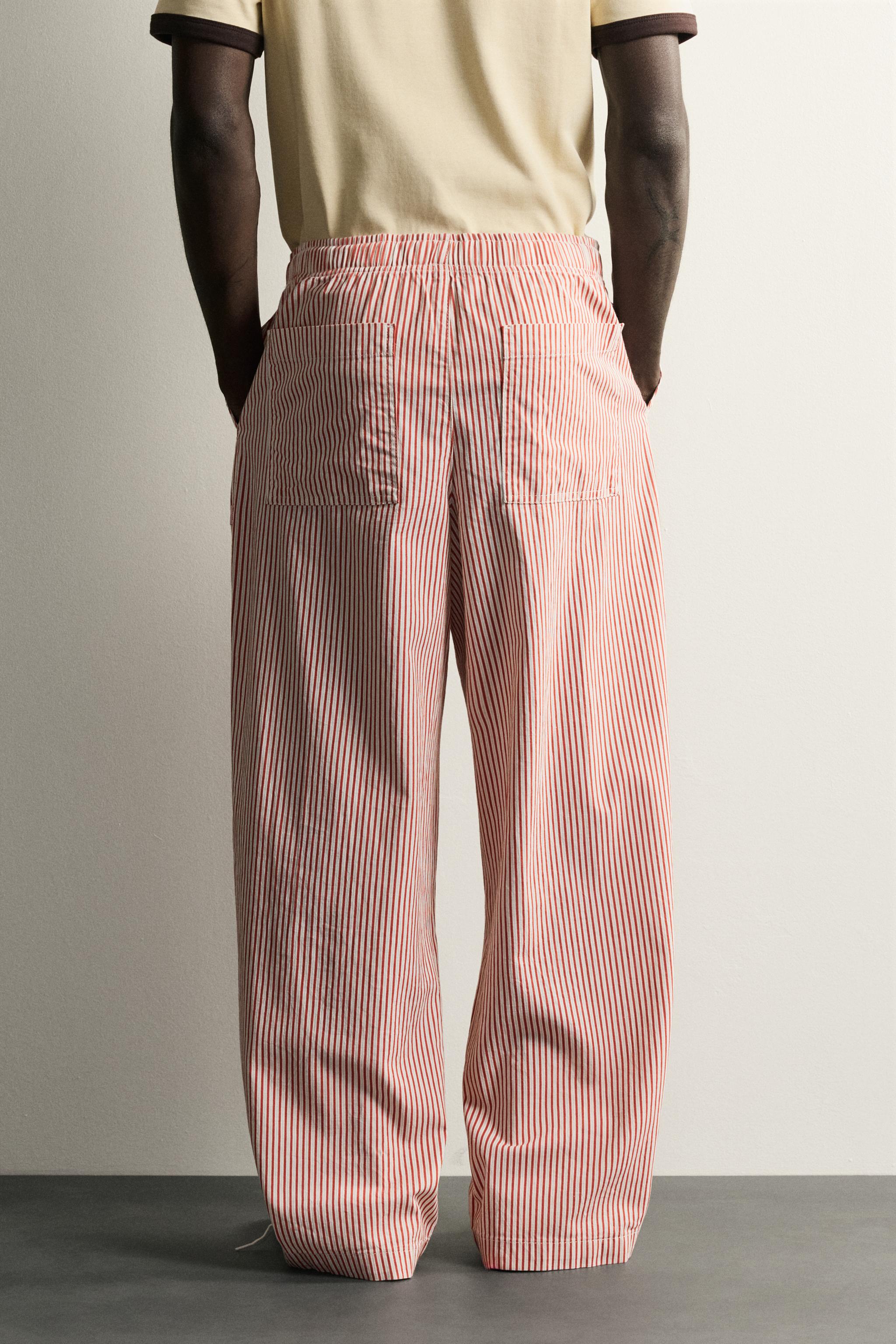 STRIPED BAGGY FIT PANTS