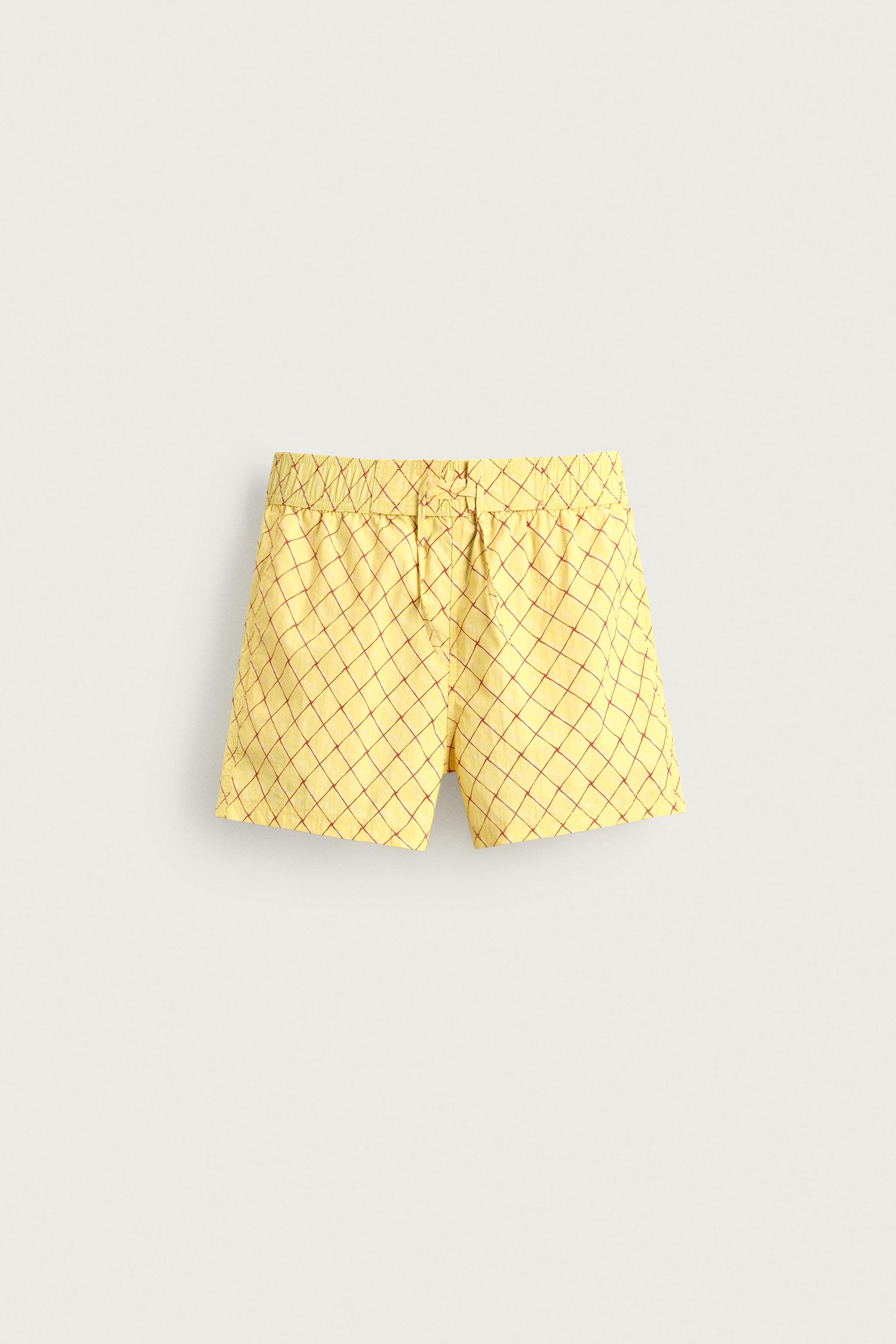 FADED GEOMETRIC PRINT SWIM SHORTS — Yellow
