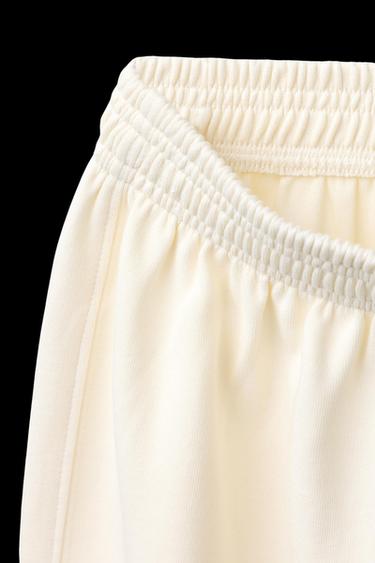 INTERLOCK WIDE-LEG TROUSERS - Ecru by Zara