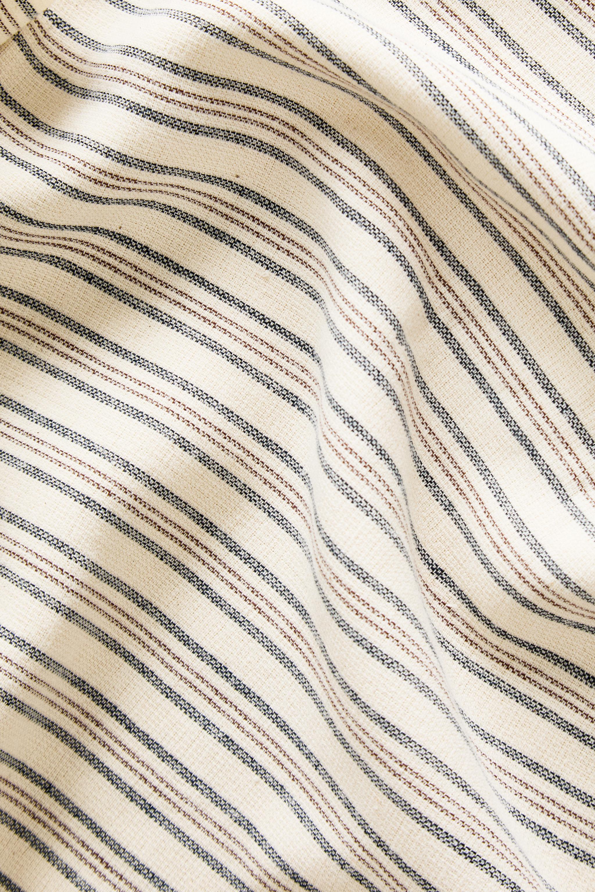 STRIPED COTTON BEACH TOWEL WITH FRINGING