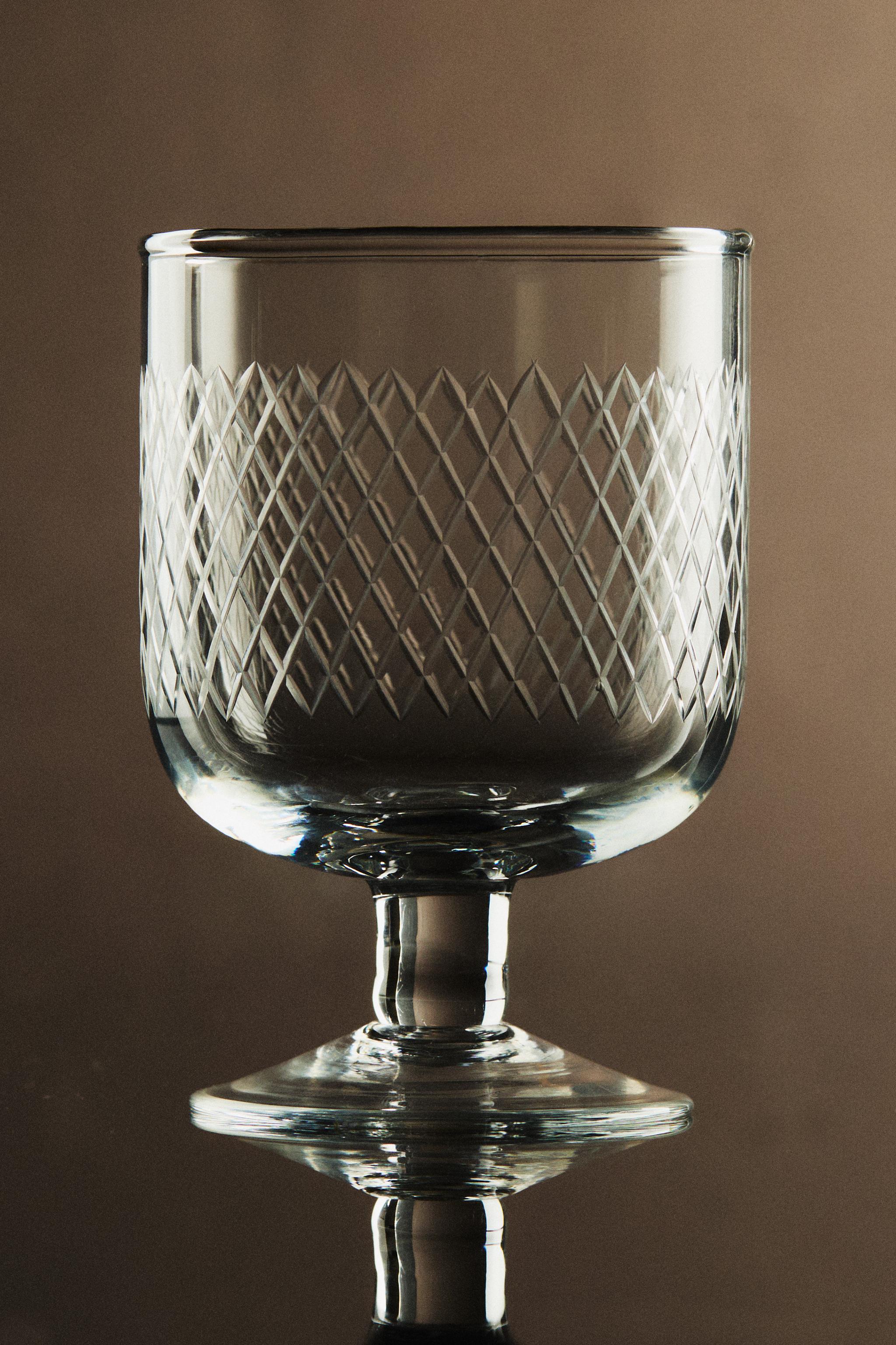 CARVED GLASS GOBLET