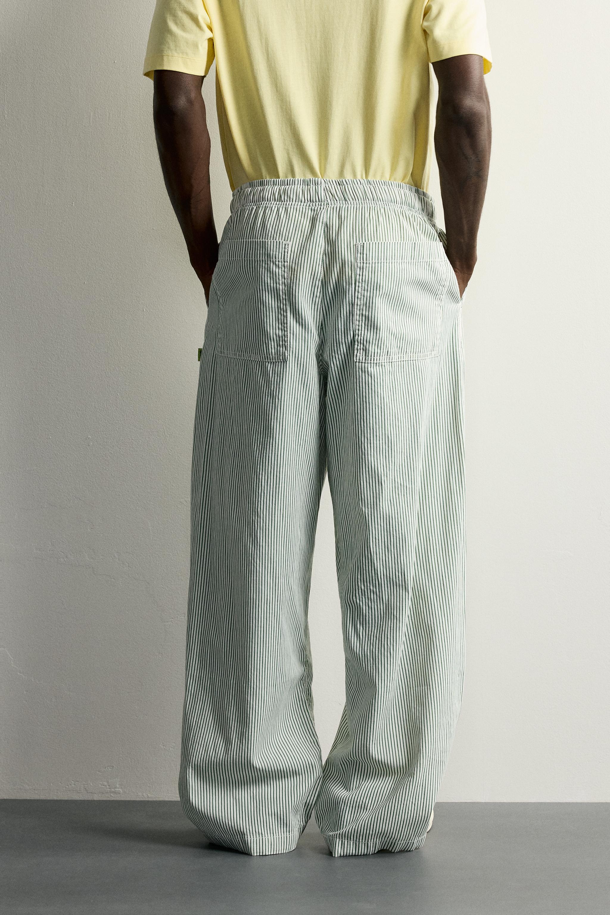 STRIPED BAGGY FIT PANTS