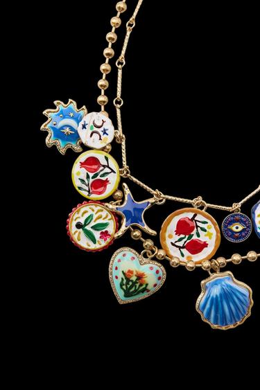 PACK 2 COLLARES PALMERA FLORES RESINA - Dorado de Zara
