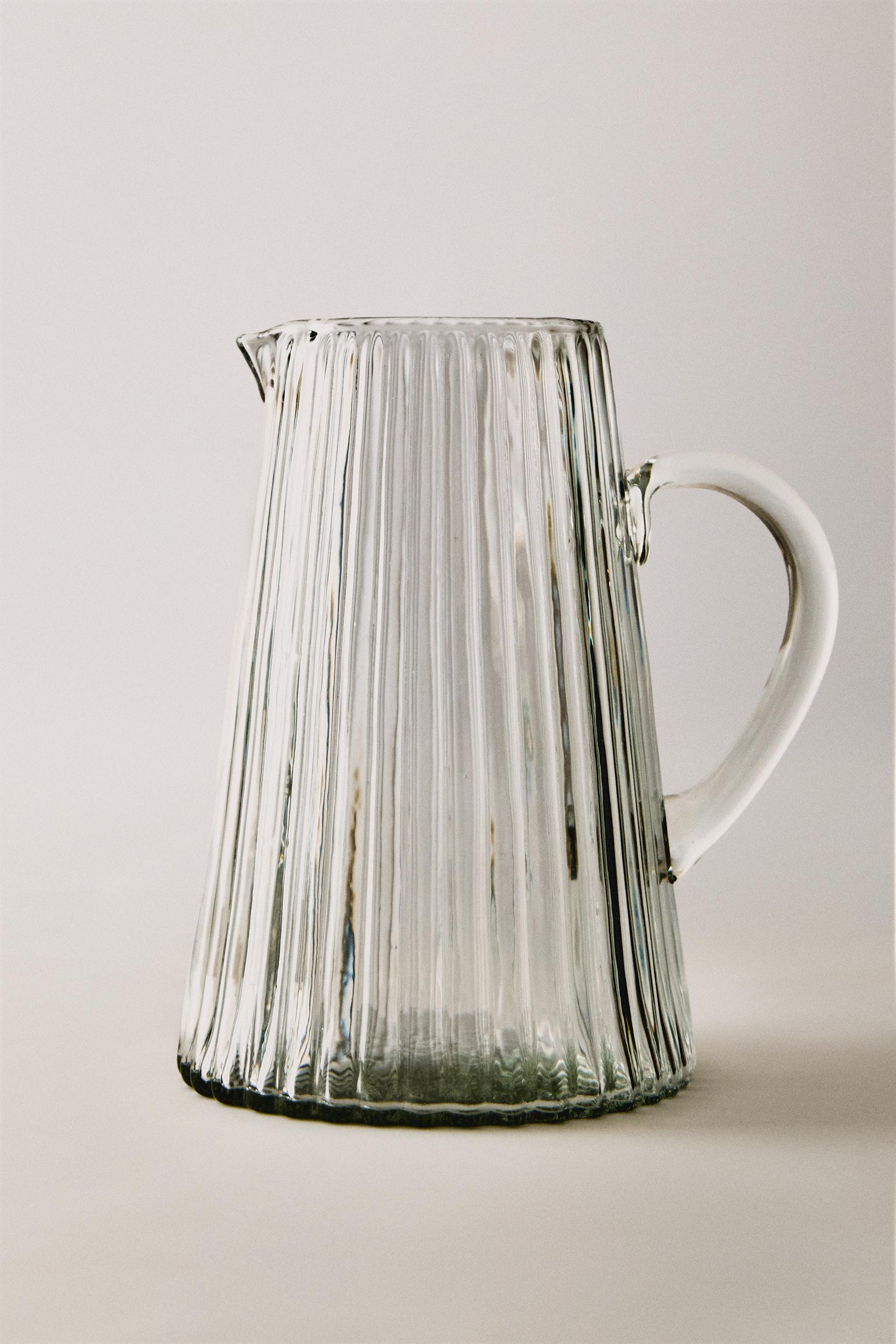 FACETED RAISED DESIGN GLASS PITCHER