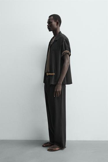 بنطلون مريح منسدل - أسود الخاص بـ Zara