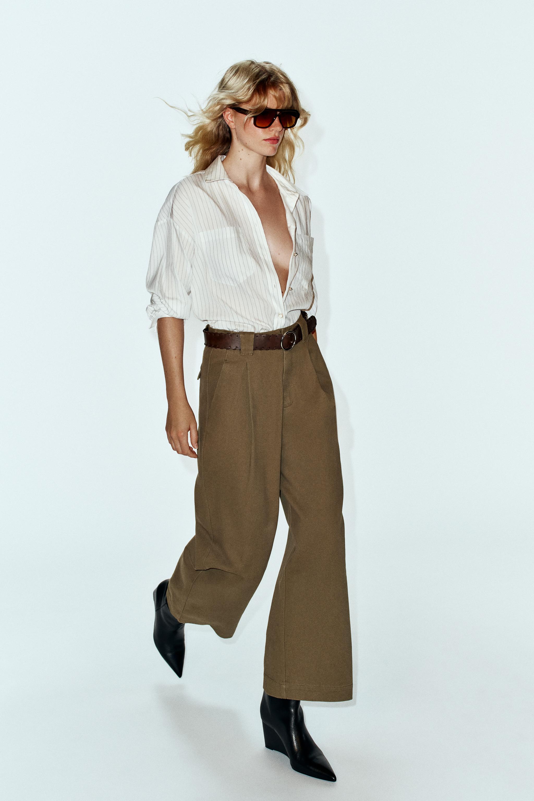 WIDE-LEG PLEATED BELTED PANTS