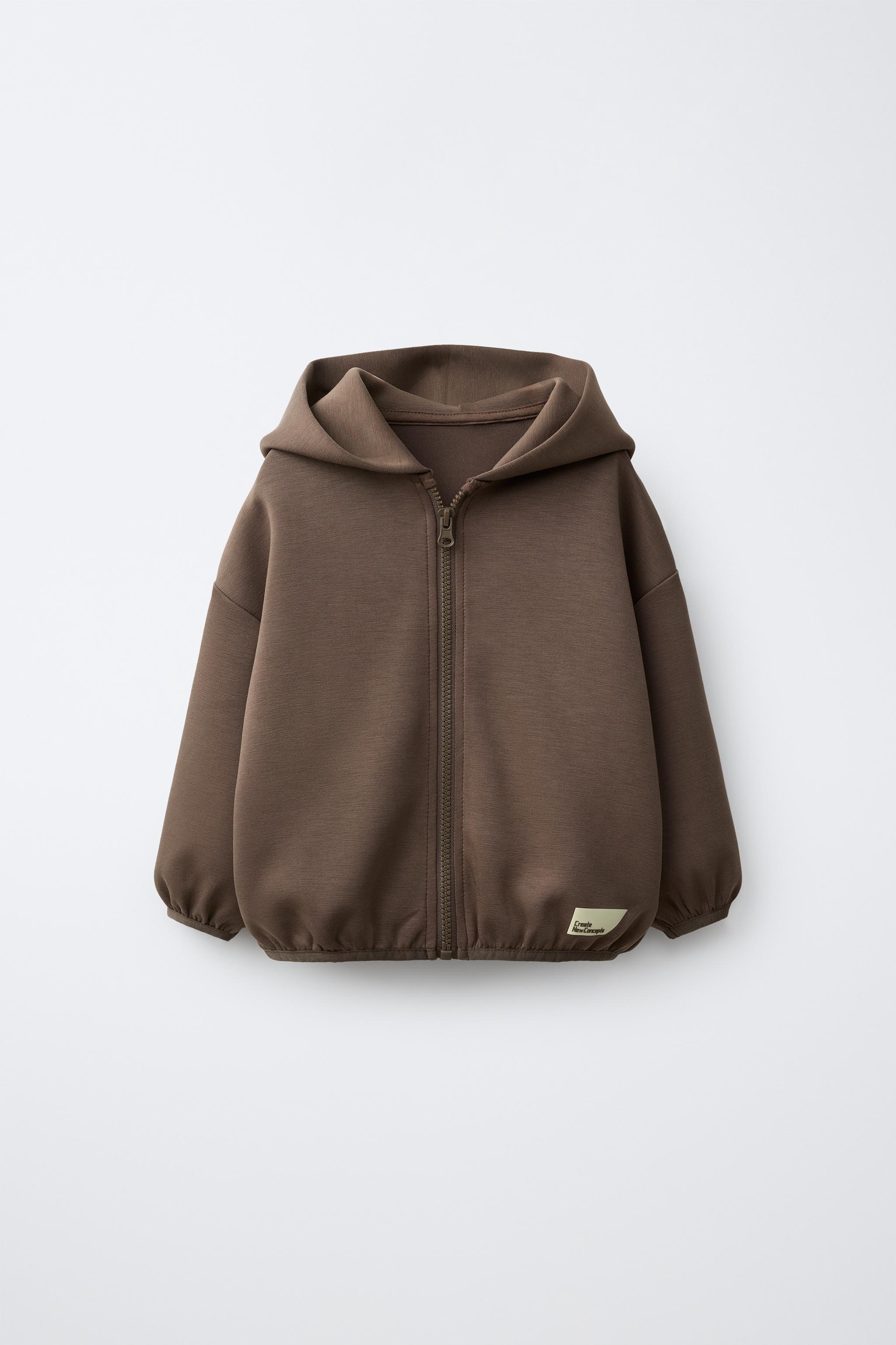 INTERLOCK ZIP-UP HOODIE — Brown