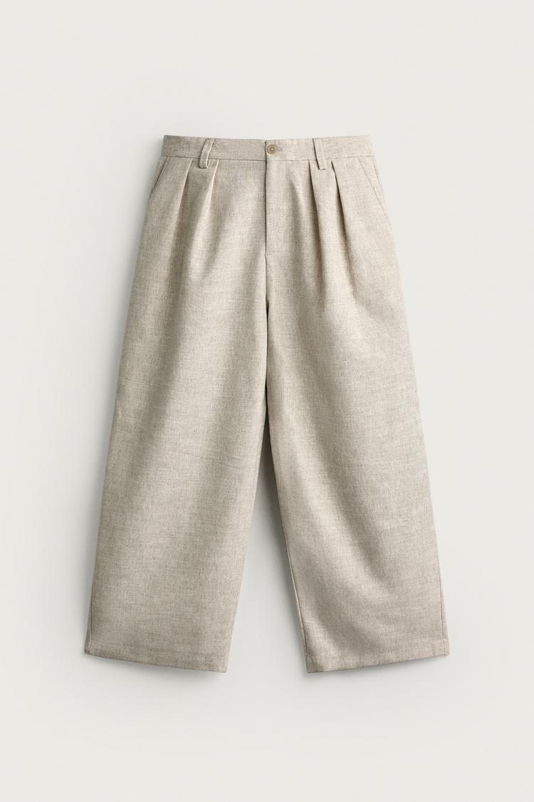 PANTALÓN CON PLIEGUES RELAXED FIT TEXTURIZADO 6