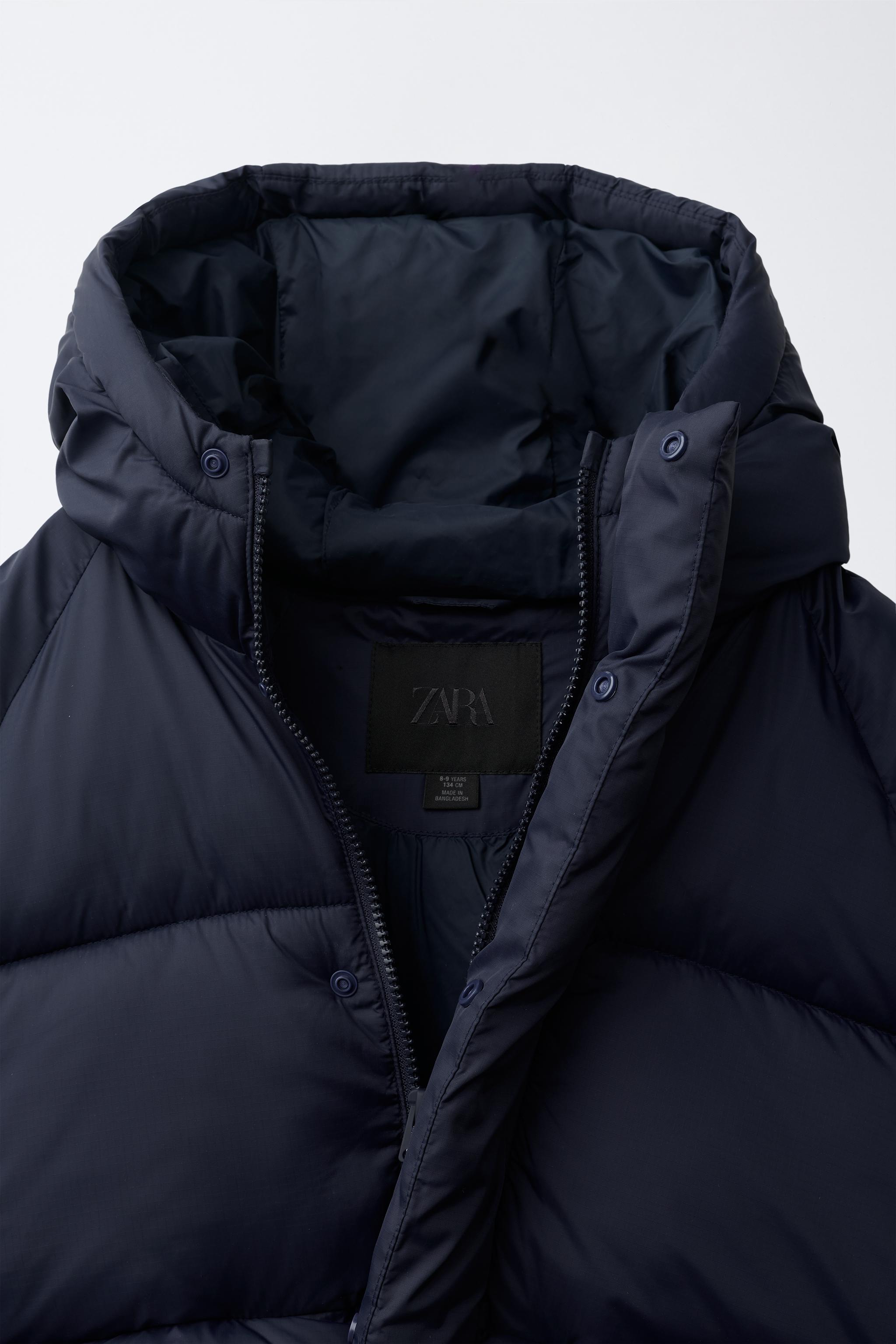 MANTEAU MATELASSÉ À CAPUCHE DÉPERLANT