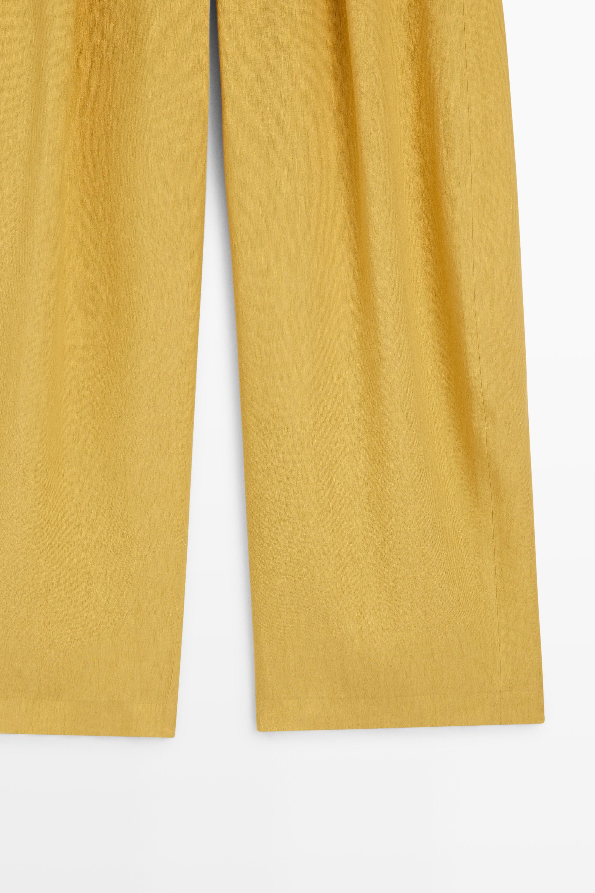 Wide-leg flowing linen blend pleated pants