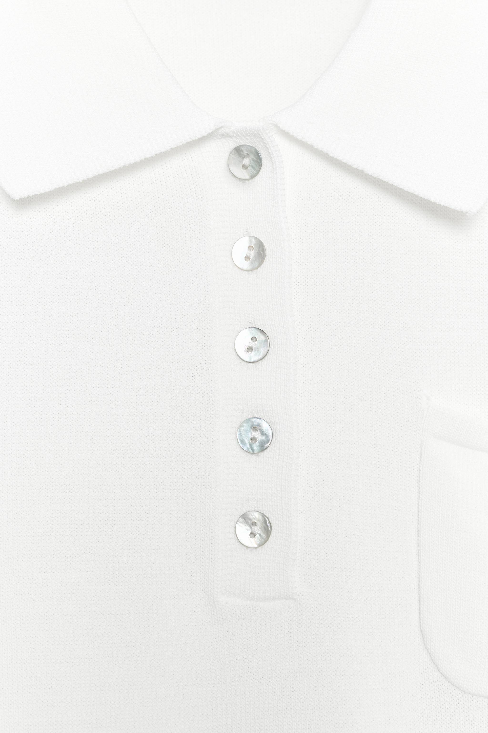 POLO EN MAILLE À MANCHES COURTES